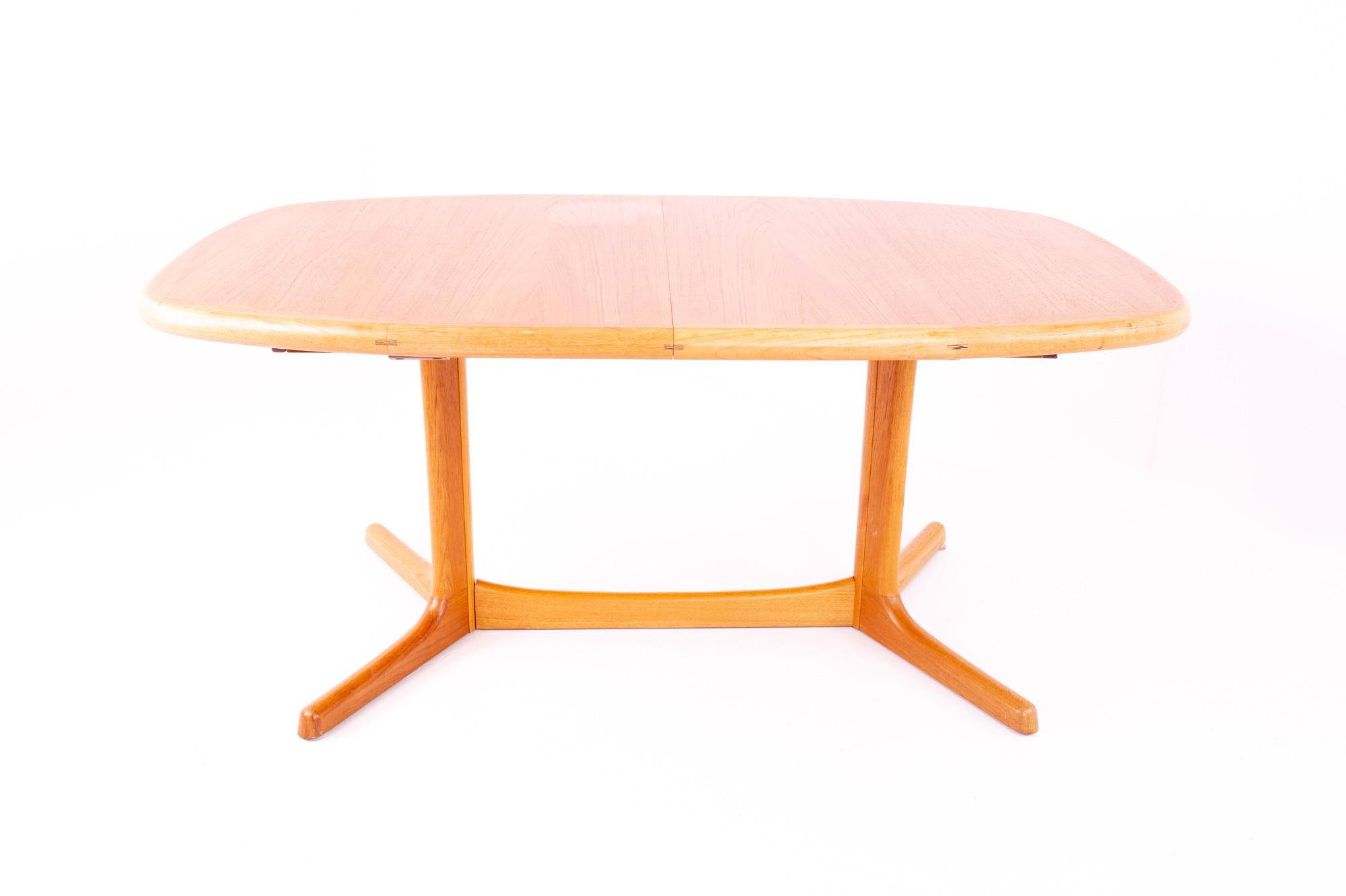 Dyrlund teak Mid Century 10 person dining table

Table measures: 64 wide x 42 deep x 28.5 high

This price includes getting this piece in what we call restored vintage condition. Upon purchase it is fixed so it’s free of watermarks, chips, or deep