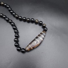 Dzi Pendant Centerpiece, Obsidian Beads Knotted Necklace  Sterling Silver Clasp