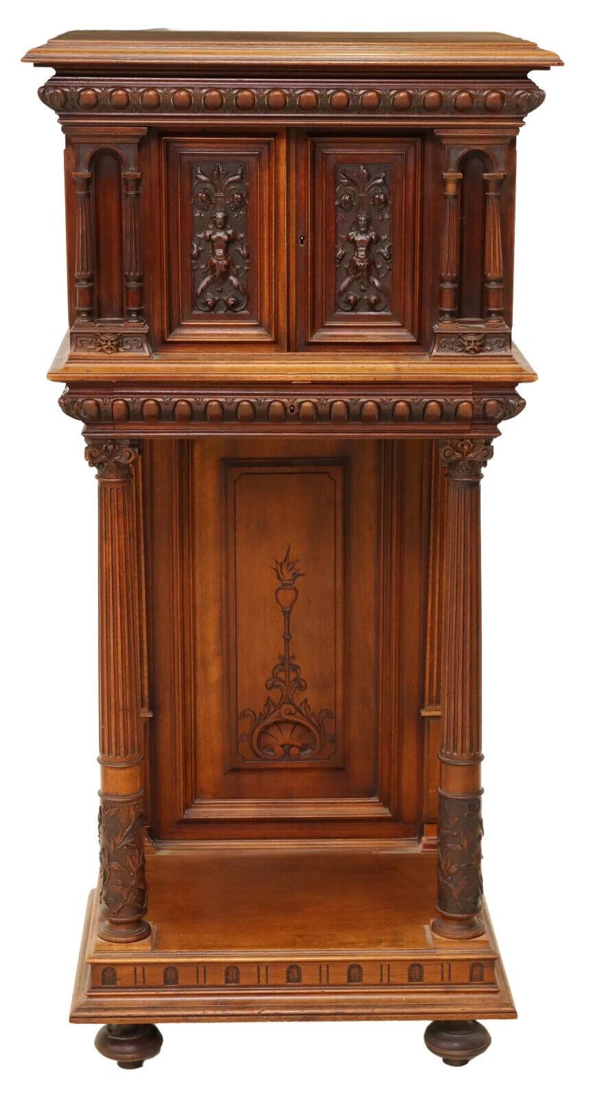 Handsome Antique Cabinet French Neoclassical, Carved, Walnut, On Stand, Figural, 20th Century Early. 1900's!!  Great for displays of your antique treasures!

French Neoclassical carved walnut cabinet, early 20th c., having stepped cornice, dual