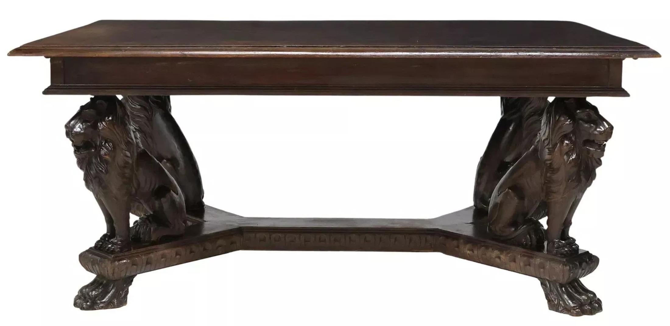 Stunning Table, Extension, Lions, Italian Renaissance Revival, Carved, Walnut, E. 1900s, 20th Century!!

This antique dining table from the early 1900s features a classic Italian Renaissance Revival design with intricate carvings of lions and paw