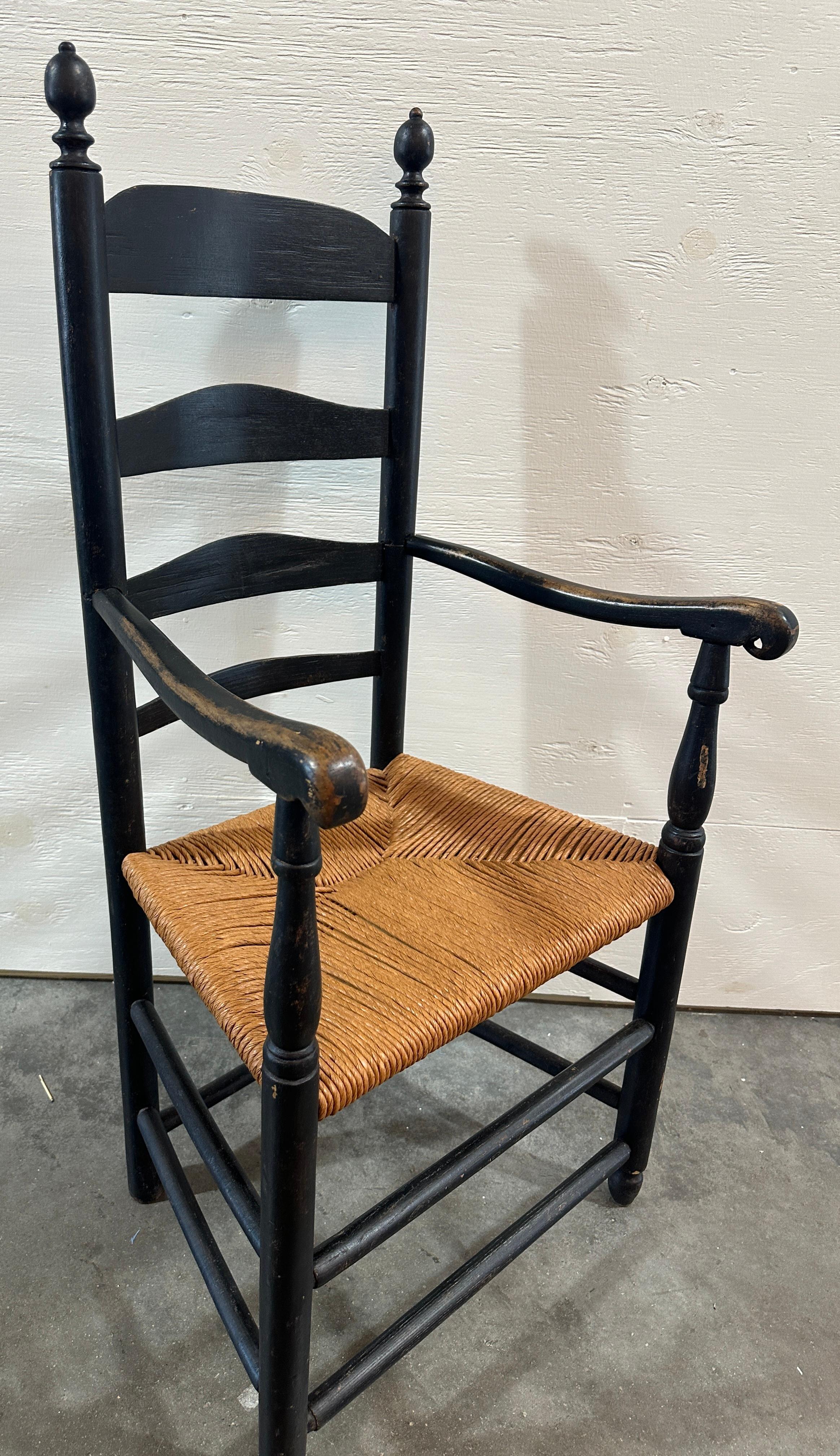 Early 29th hand Made English Ladder Back. Wonderful Condition. Honest wear to the knuckle arms. the rattan seats are in wonderful condition. This Ladder back is very strong and sturdy. 