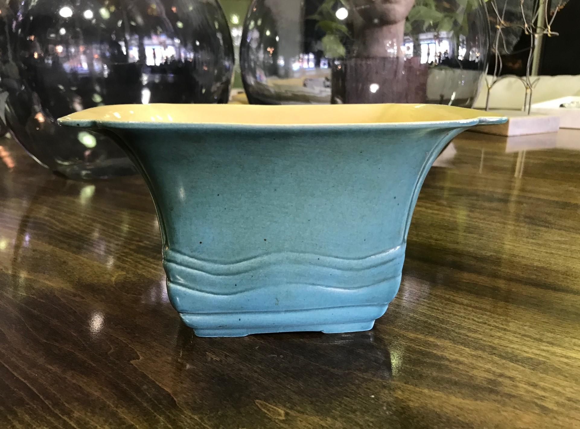 A wonderfully glazed and rare shaped work by famed Arts & Crafts ceramic artist Ernest A. Batchelder.

Batchelder was renowned in the 1930s and 1940s for his delicate, thinly made Asian inspired ceramics which he produced at his Kinneloa Avenue