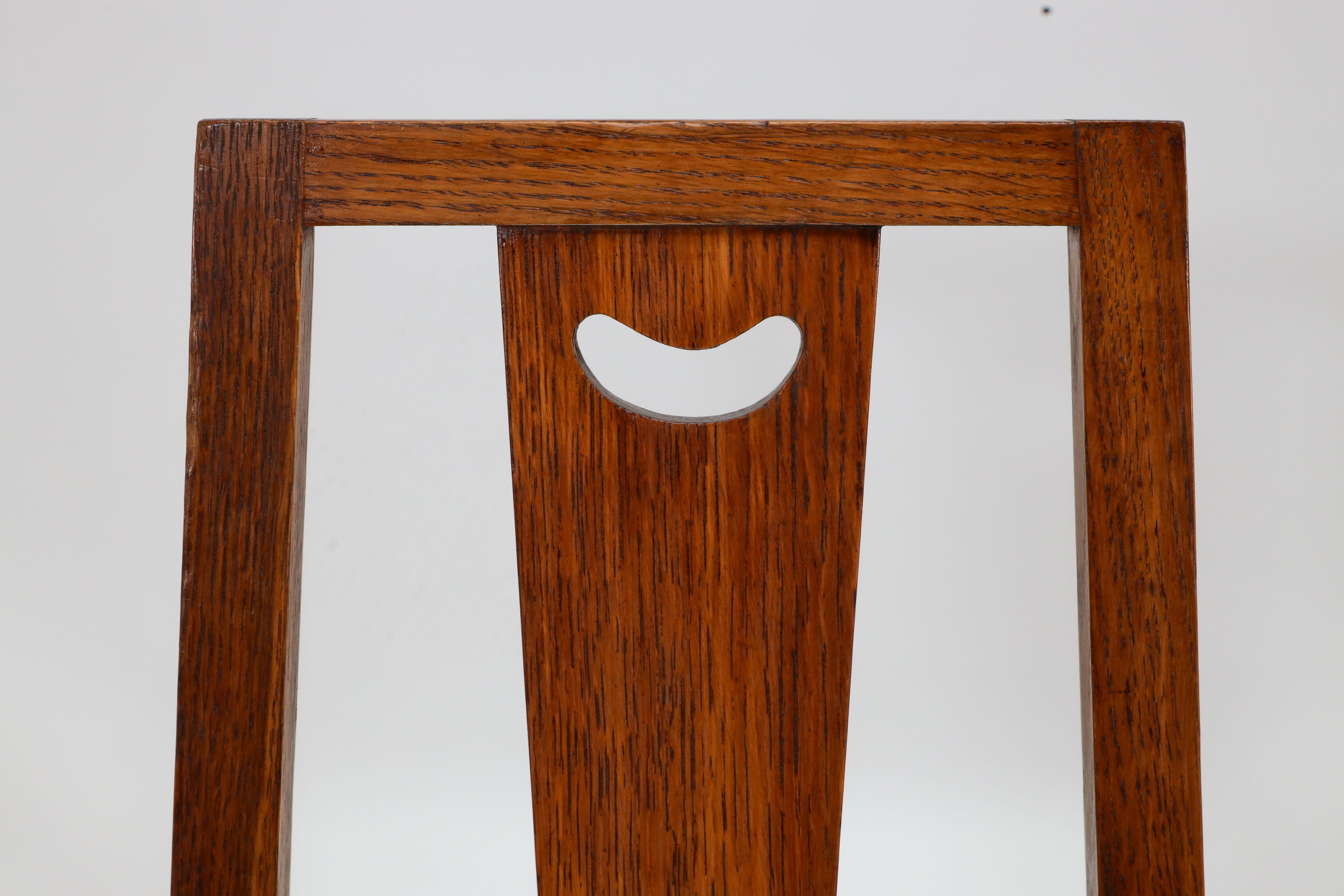 E A Taylor. A set of five Arts and Crafts oak side chairs with heart cut-outs. For Sale 3