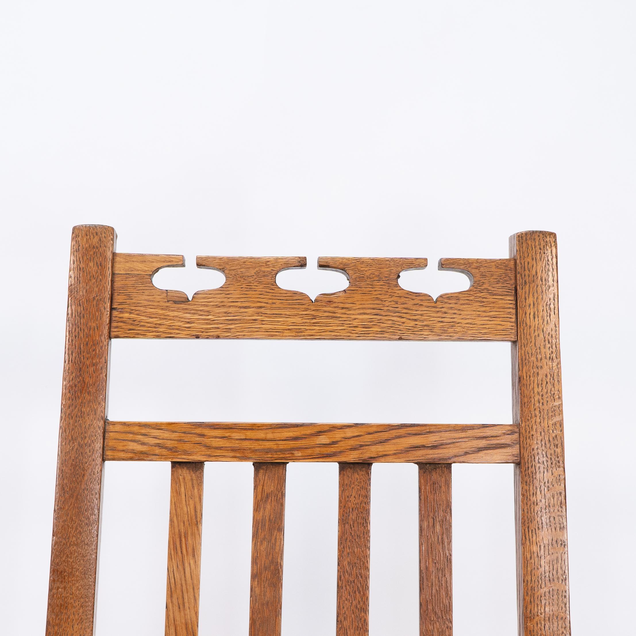 20th Century E A Taylor attri for Wylie & Lochhead. A pair of Arts & Crafts side chairs For Sale