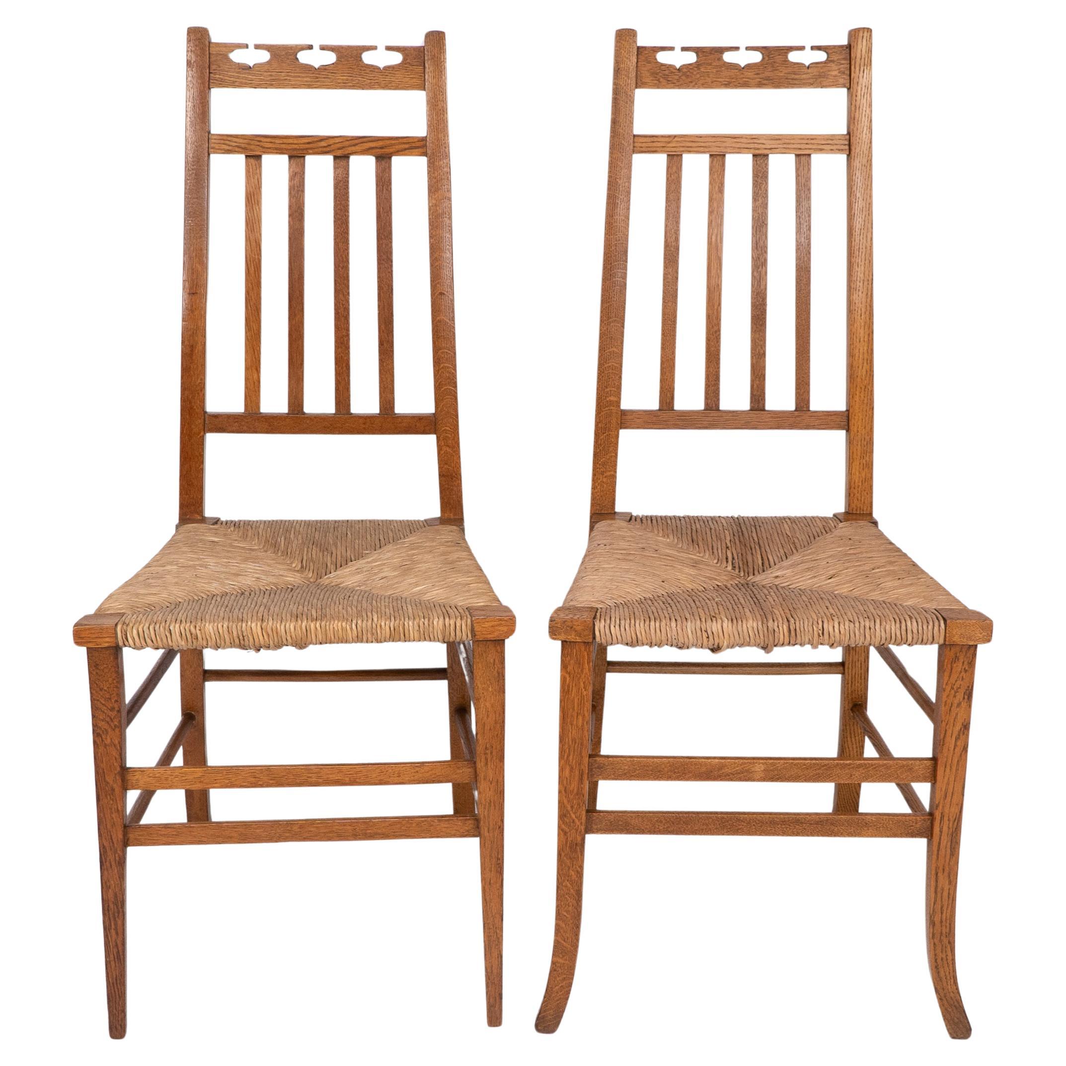E A Taylor attri for Wylie & Lochhead. A pair of Arts & Crafts side chairs For Sale