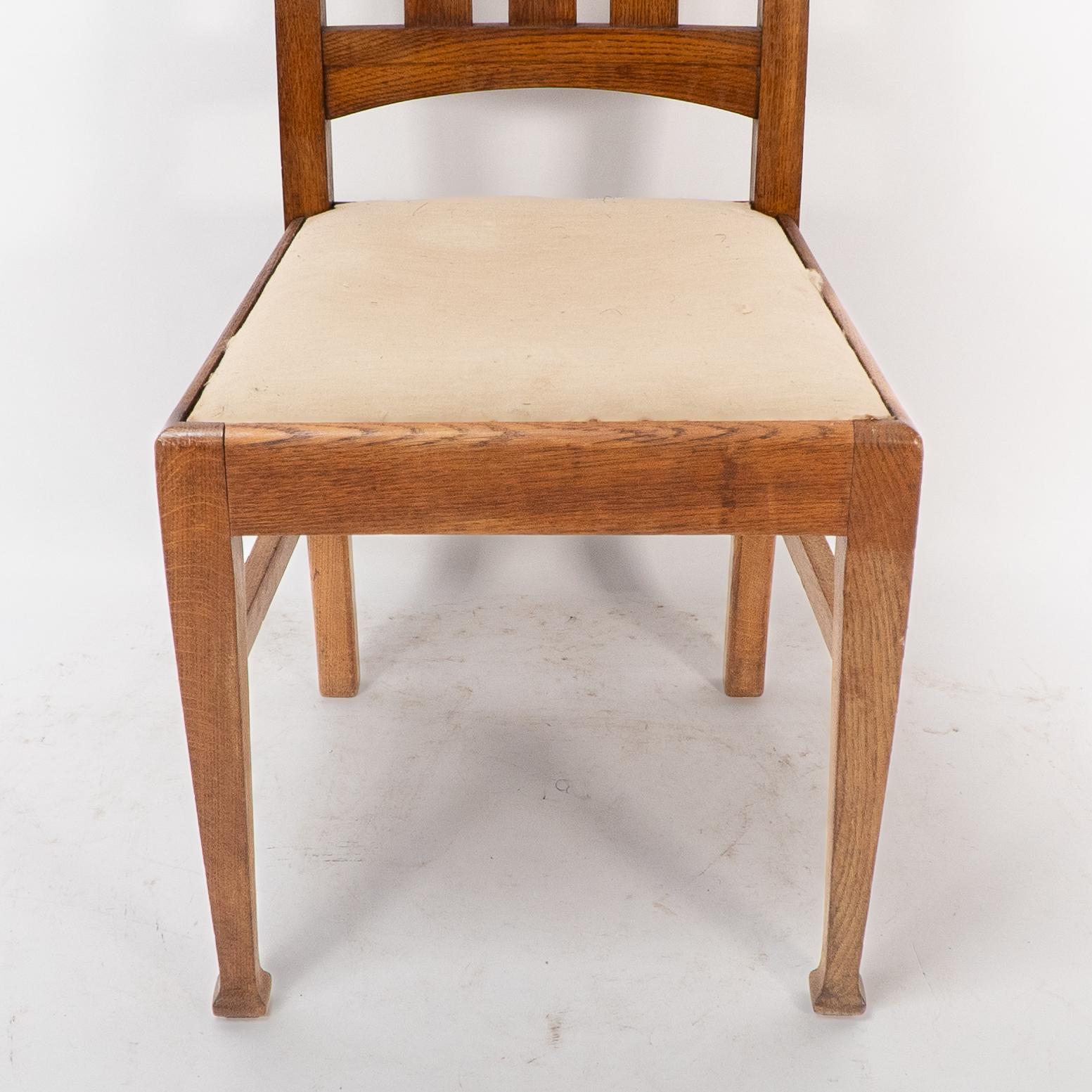 E A Taylor for Wylie & Lochhead. A set of four Arts and Crafts oak dining chairs For Sale 4