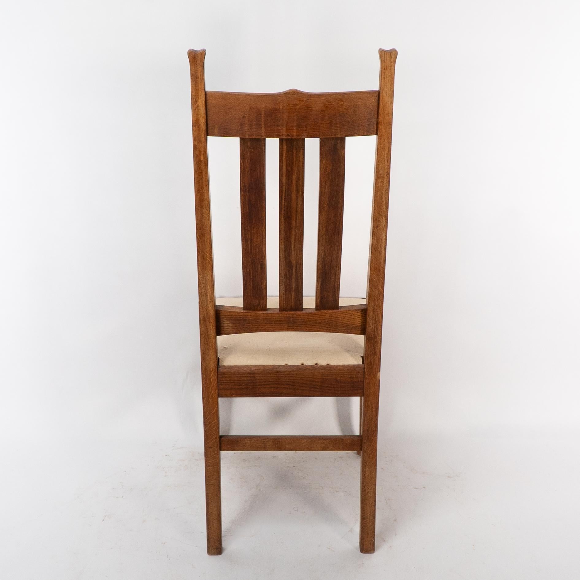 E A Taylor for Wylie & Lochhead. A set of four Arts and Crafts oak dining chairs For Sale 8