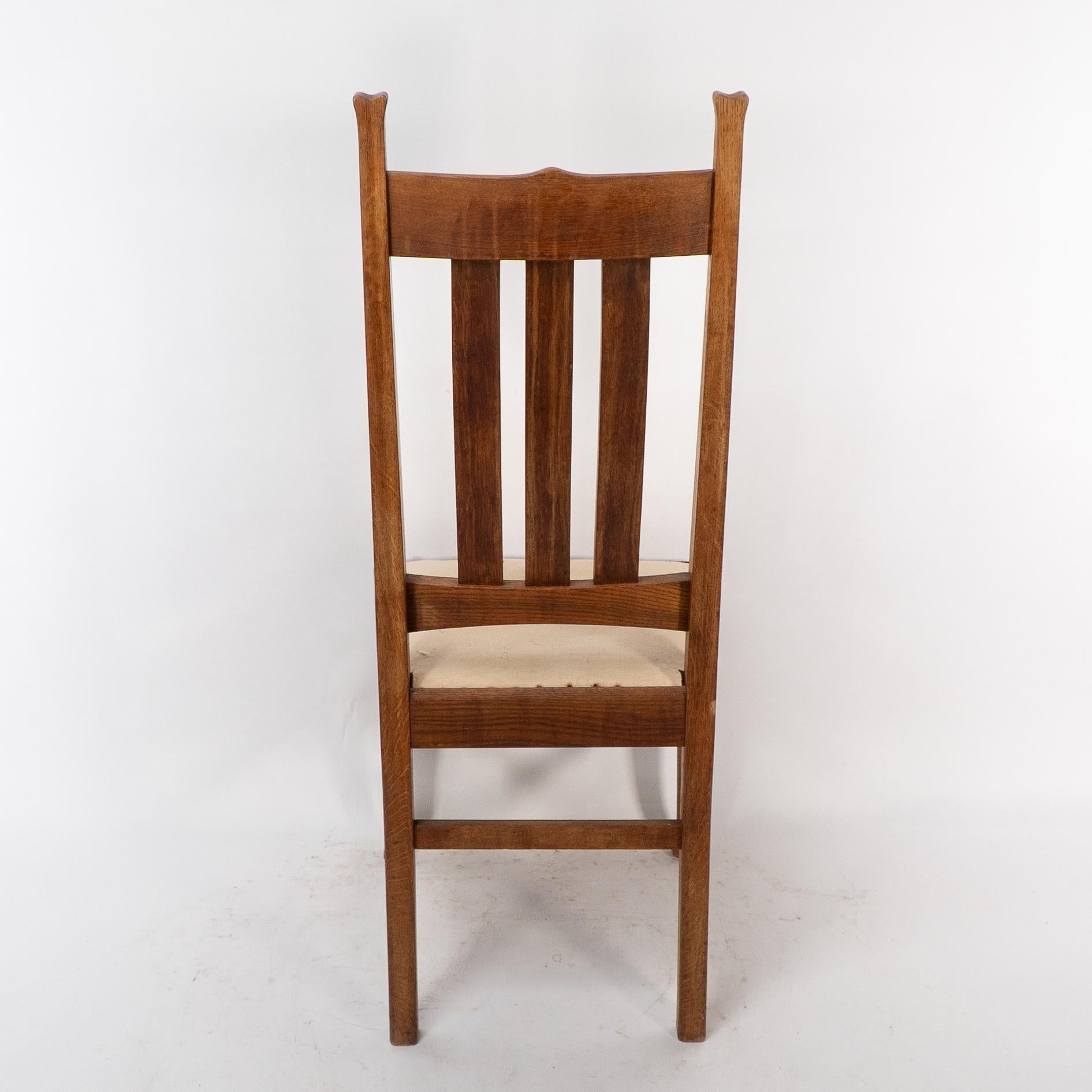 E A Taylor for Wylie & Lochhead. A set of four Arts and Crafts oak dining chairs 8