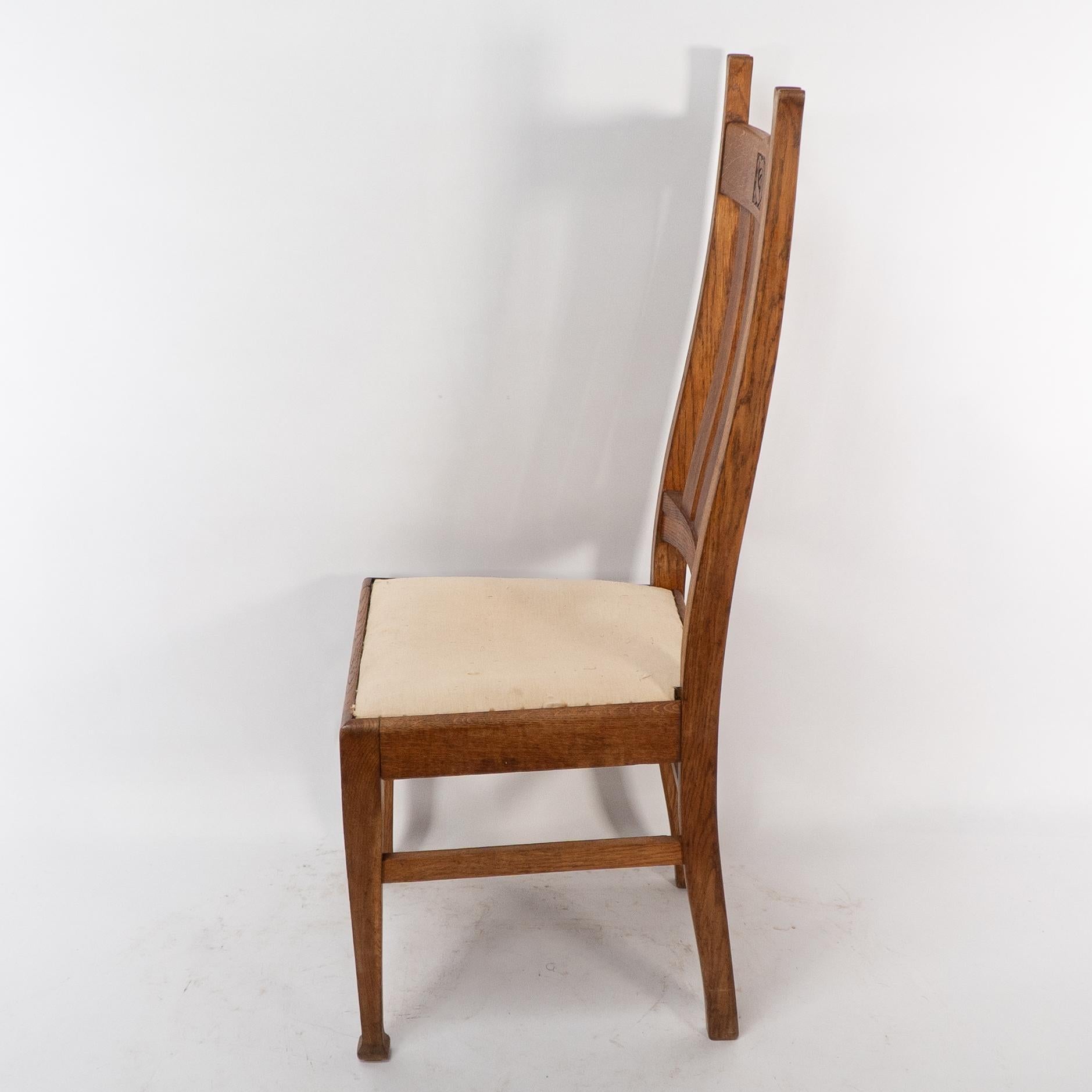 E A Taylor for Wylie & Lochhead. A set of four Arts and Crafts oak dining chairs For Sale 1