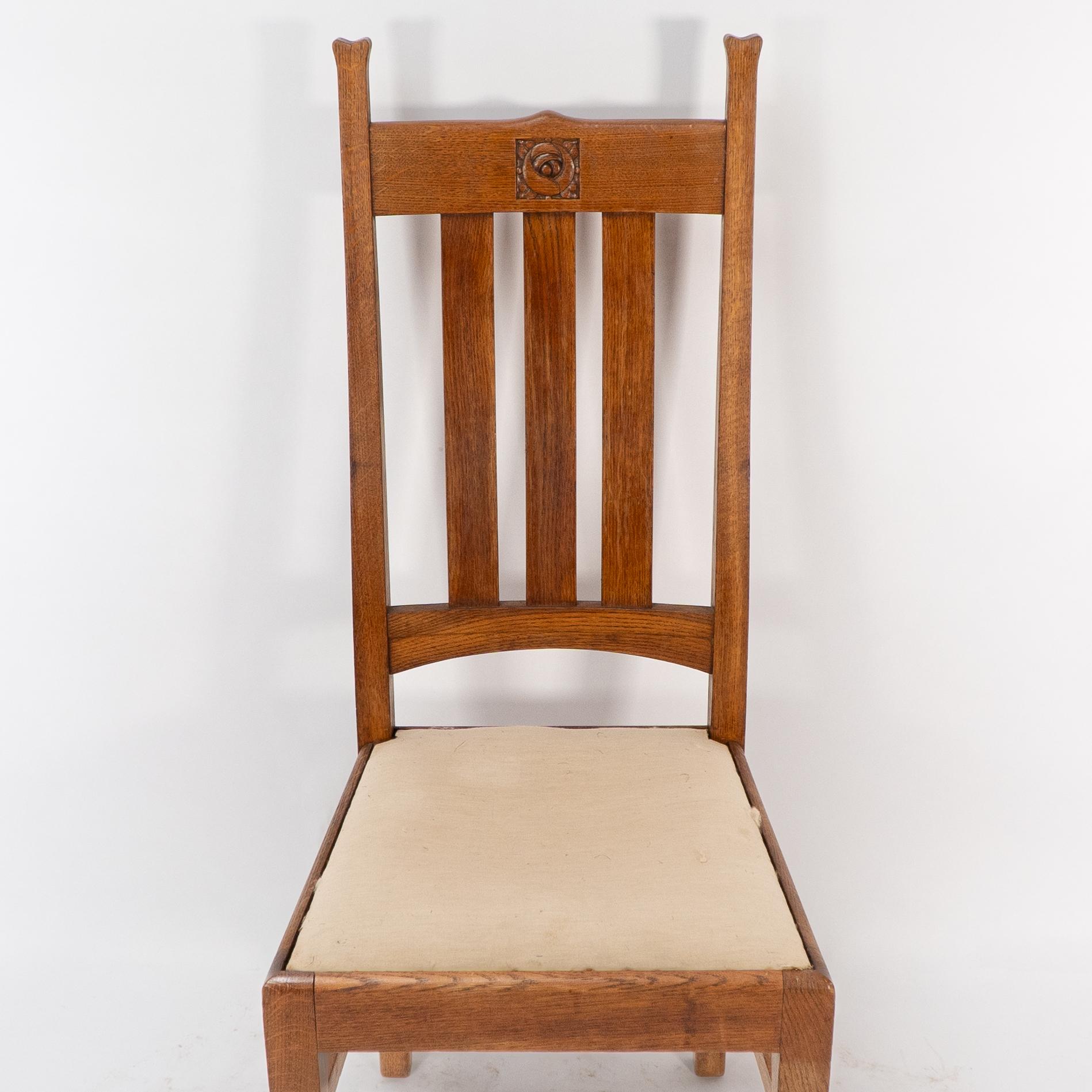 E A Taylor for Wylie & Lochhead. A set of four Arts and Crafts oak dining chairs 2