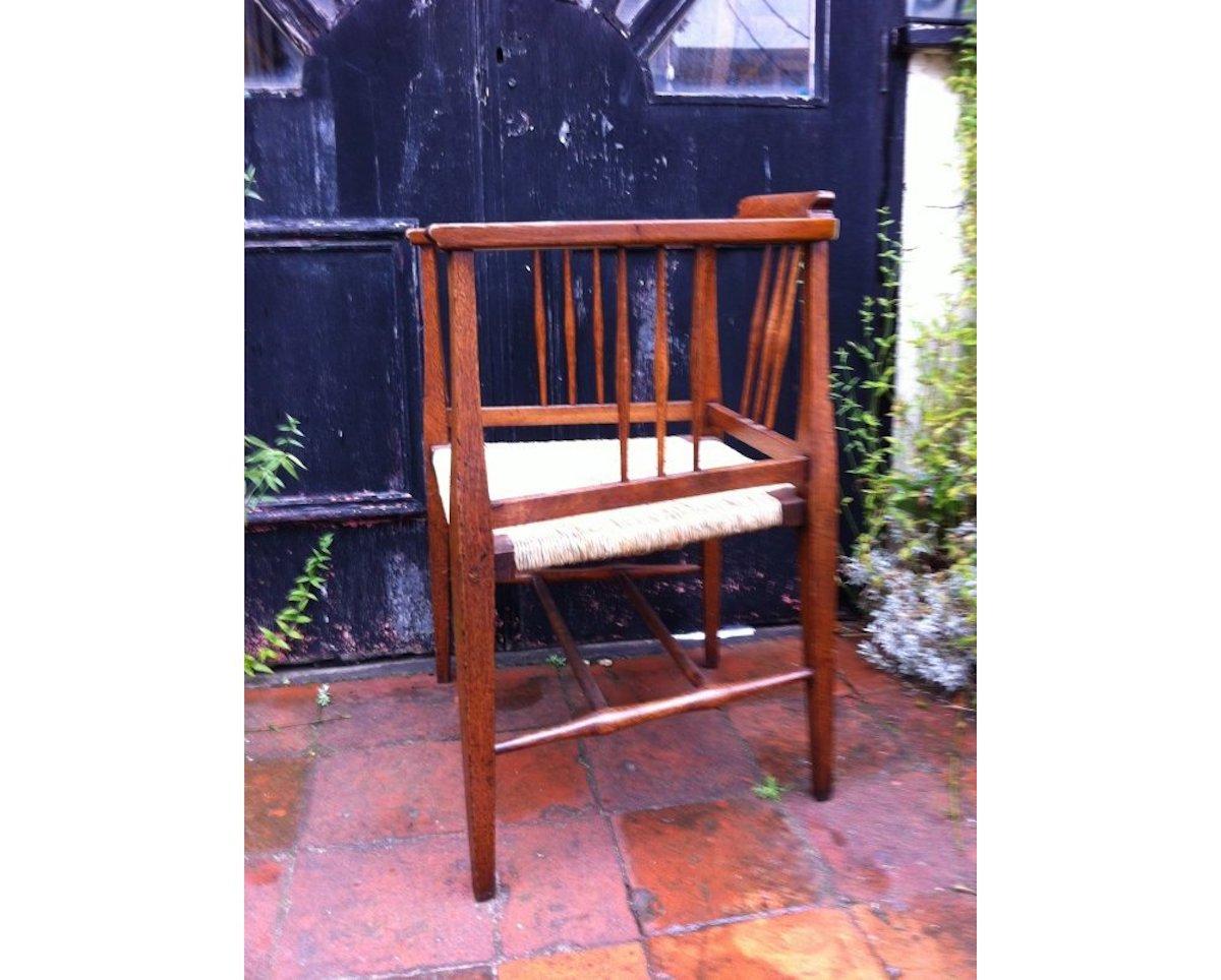 20th Century E A Taylor, Wylie and Lochhead or Shapland & Petter. A Fine Rush Seated Armchair