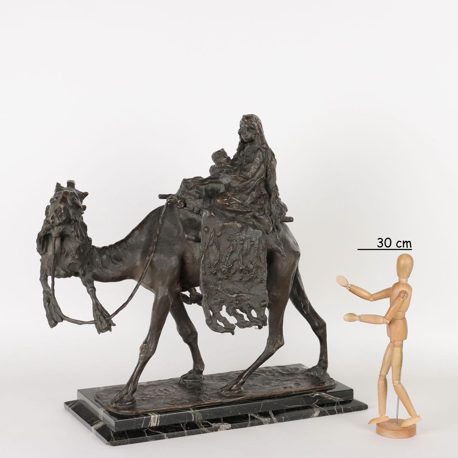 Bronze sculpture depicting Bedouin Maternity on a black marble base. Artist's signature engraved.