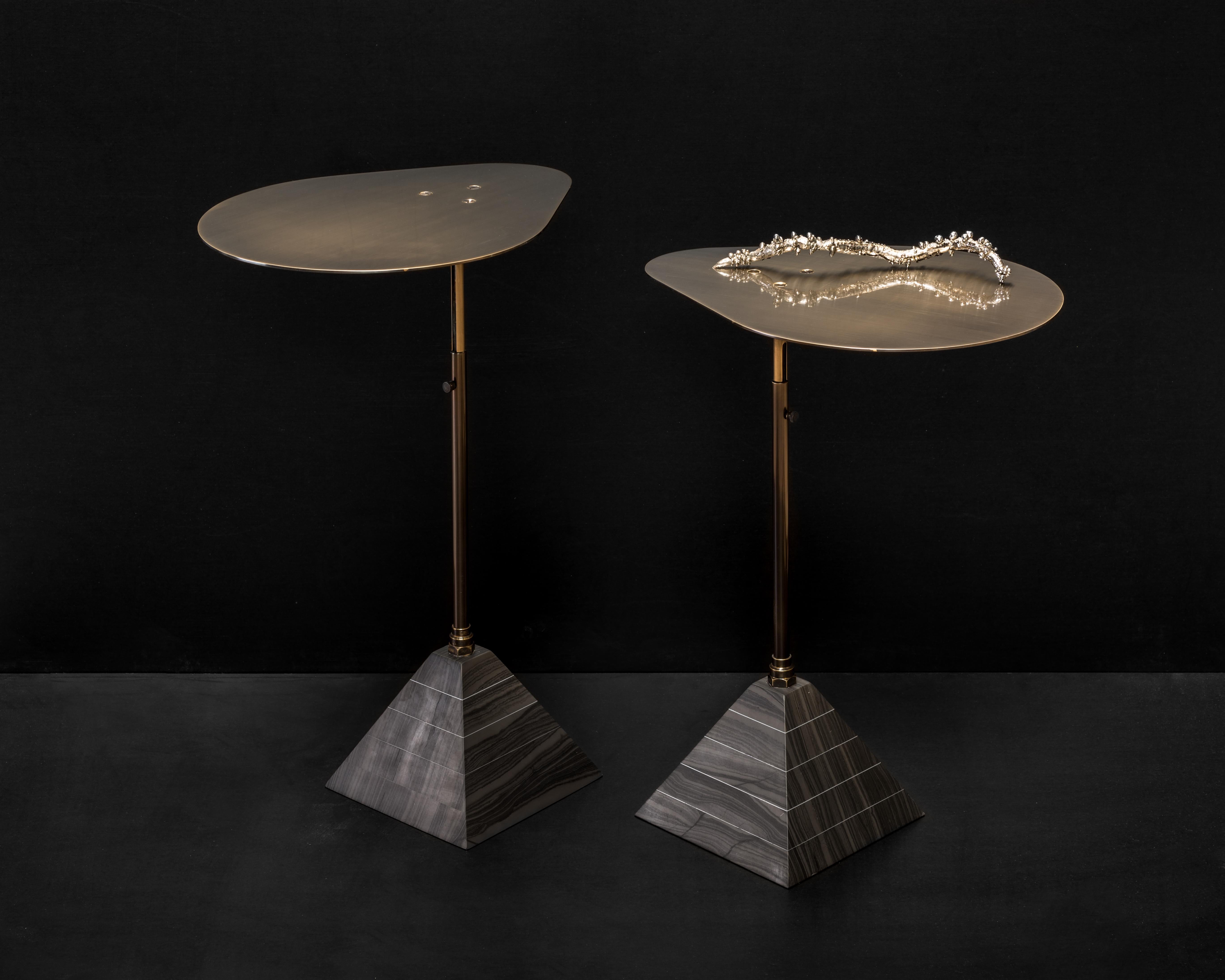'Black Mirror' polished bronze cocktail table with Telescopic Post and black marble pyramid base. 
From Maison Gerard: 'Ben Erickson, an artist living and working in Brooklyn, New York, utilizes twentieth century design's most celebrated material