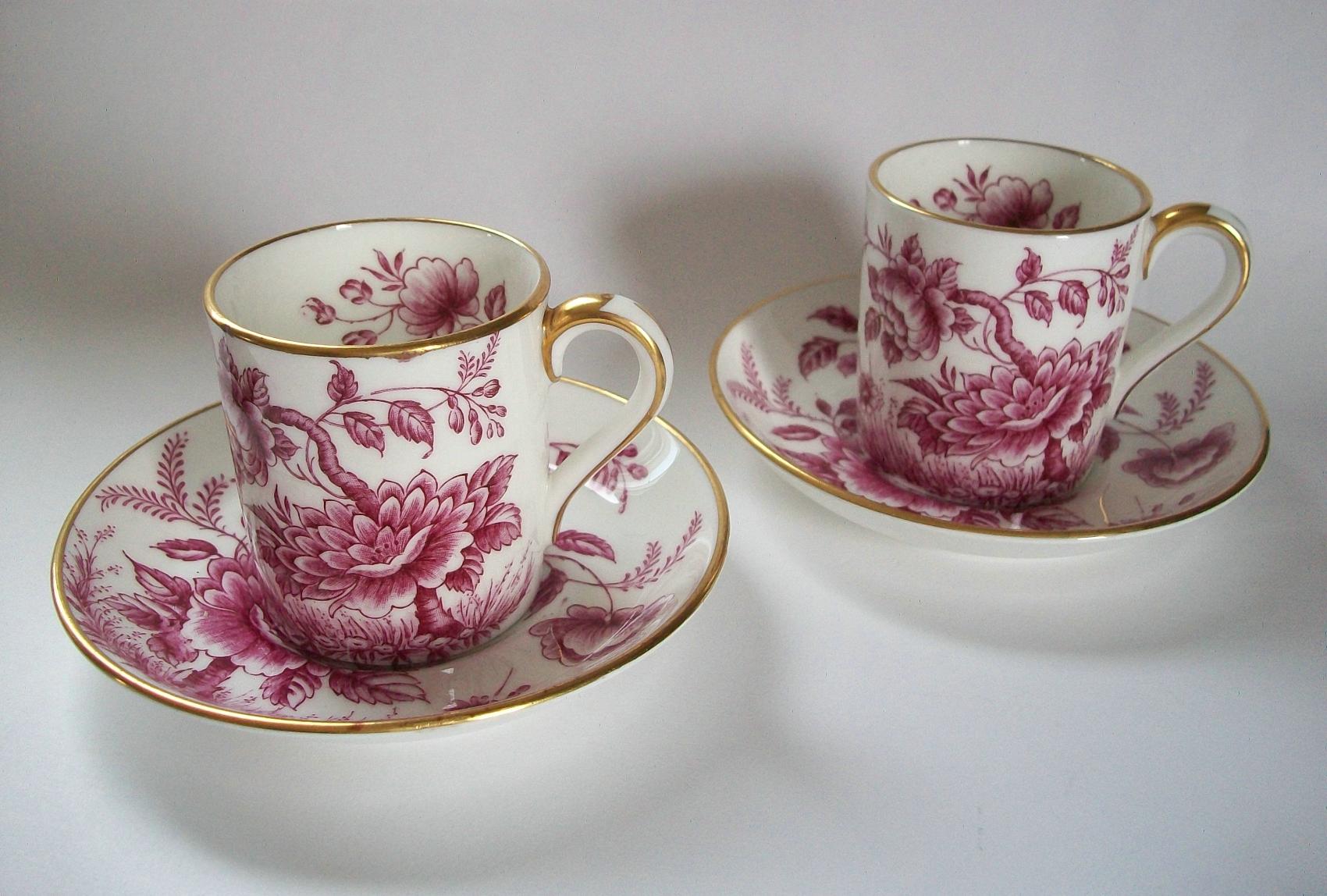 E. BRAIN & CO. LTD. - 'Peony' - Vintage transfer decorated bone china demitasse cups and saucers - manufactured at Foley Works, Fenton - featuring over abundant florals in pink with gilt borders/trim - each piece signed - United Kingdom - circa