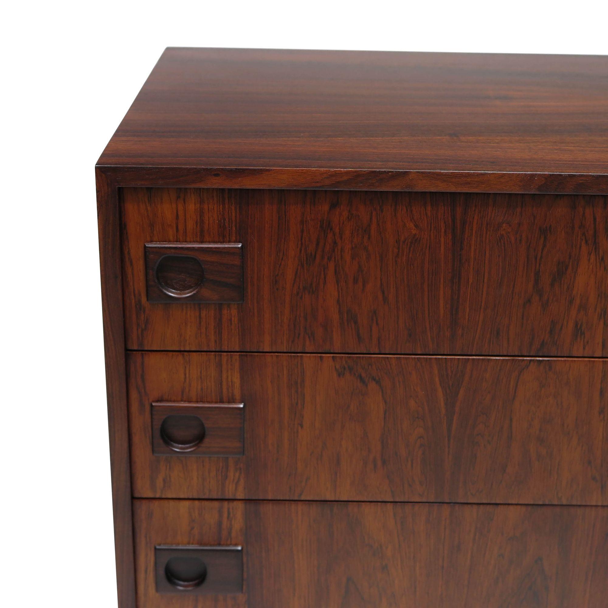 Mid-century Danish low-chest of drawers by Brouer Mobelfabrik, manufactured in Denmark, 1965. Crafted from Brazilian rosewood and featuring mitered edges, it has three drawers with square recessed pulls. The interior drawers are crafted of teak.