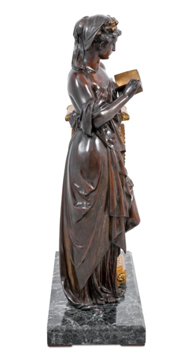 French E. Dumaige Gilt and Patinated Bronze Figural Clock For Sale