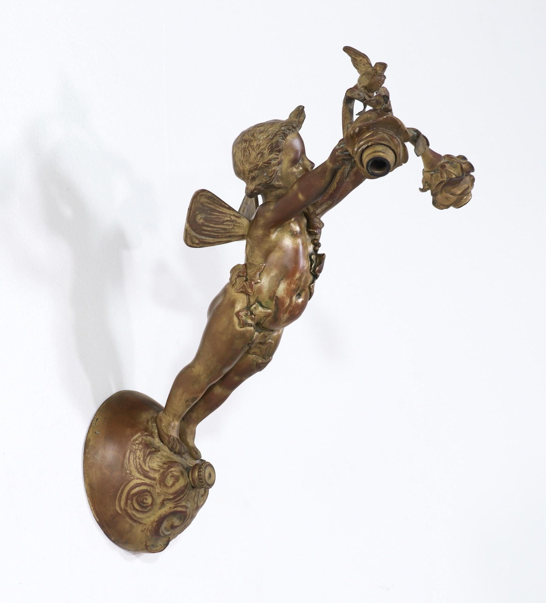 American E. F. Caldwell Bronze-Doré Putti Sconces