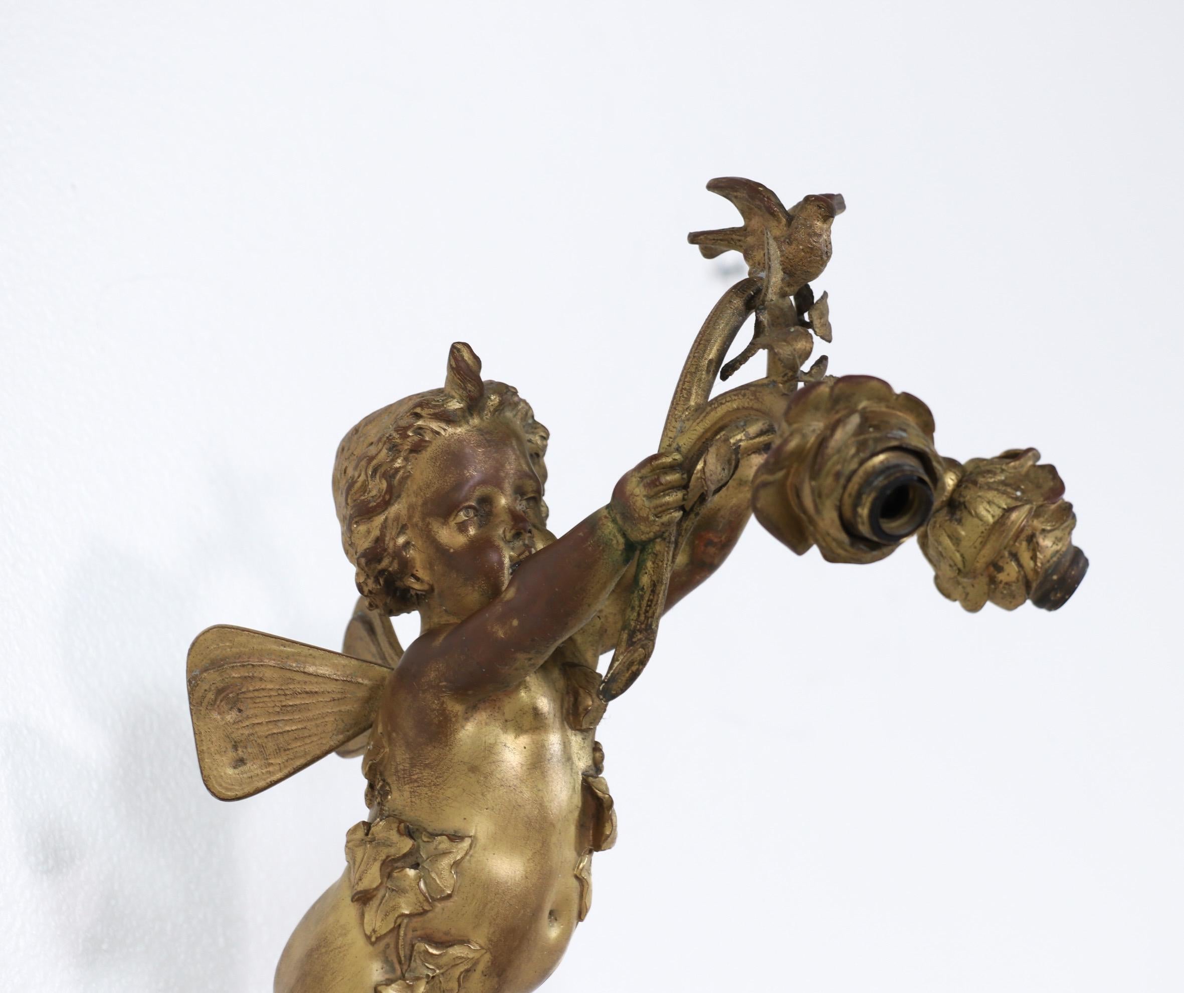 Early 20th Century E. F. Caldwell Bronze-Doré Putti Sconces