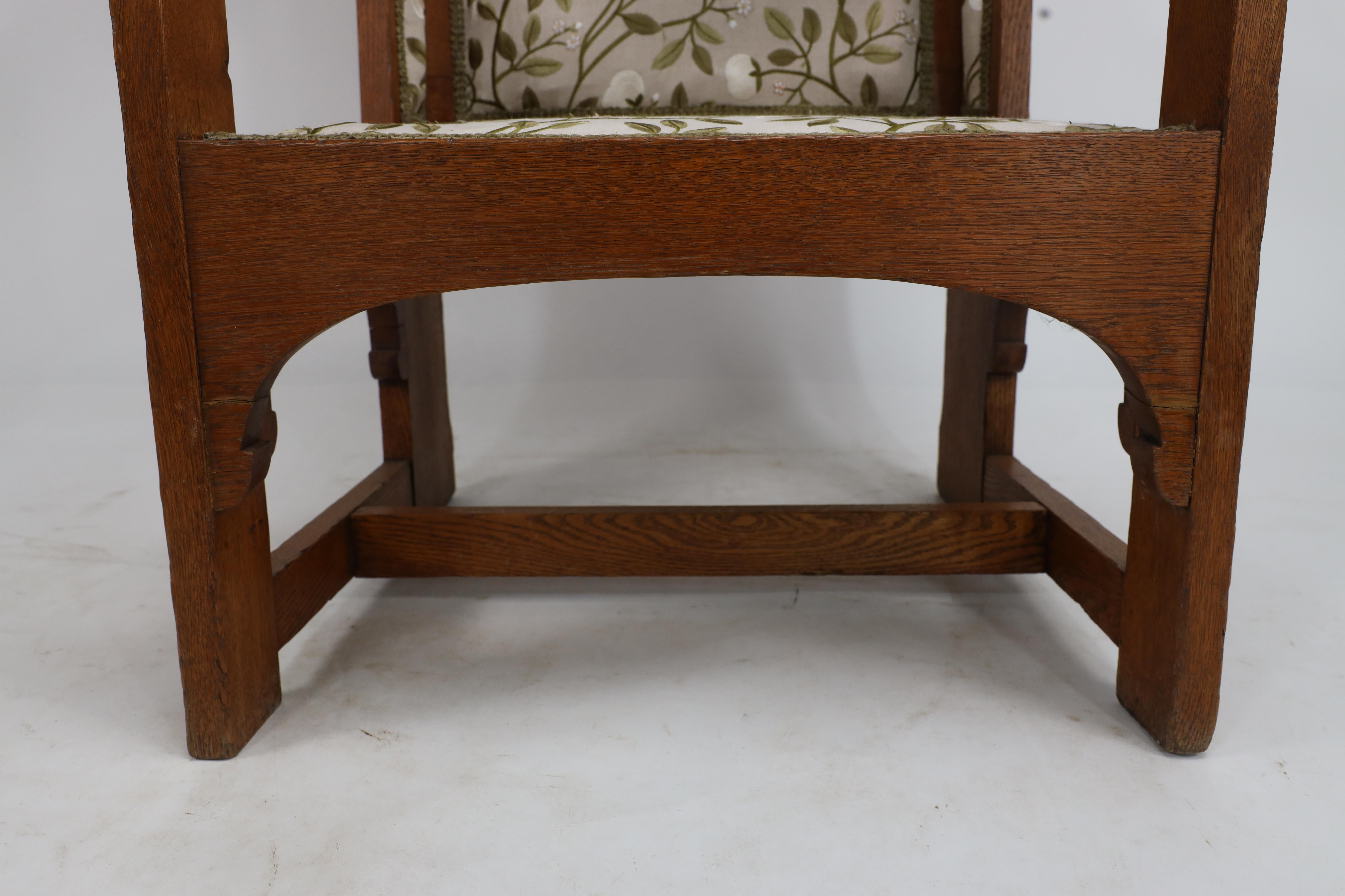 E G Punnet attributed. Probably made by William Birch. An oak wing back armchair For Sale 5