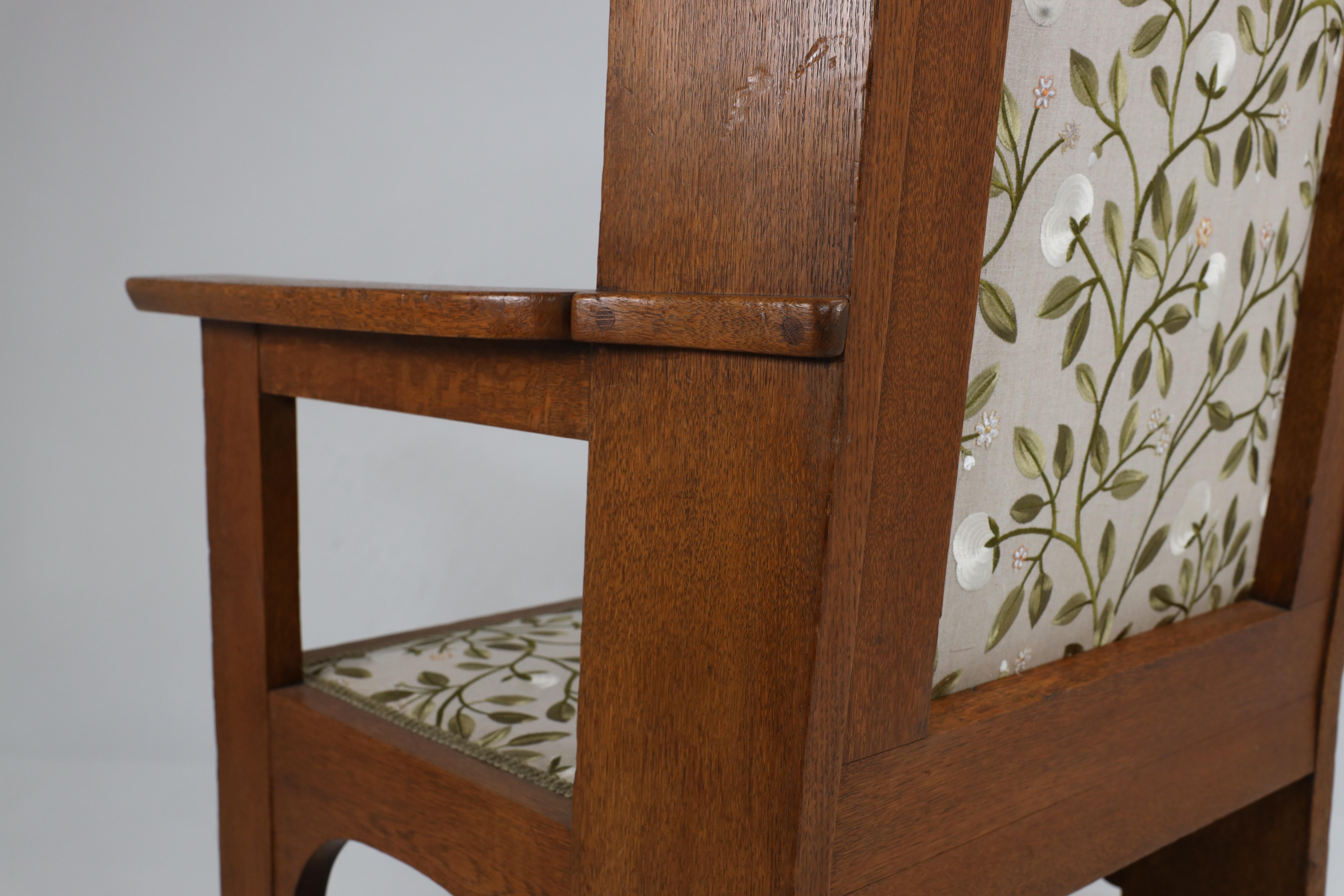 E G Punnet attributed. Probably made by William Birch. An oak wing back armchair For Sale 11