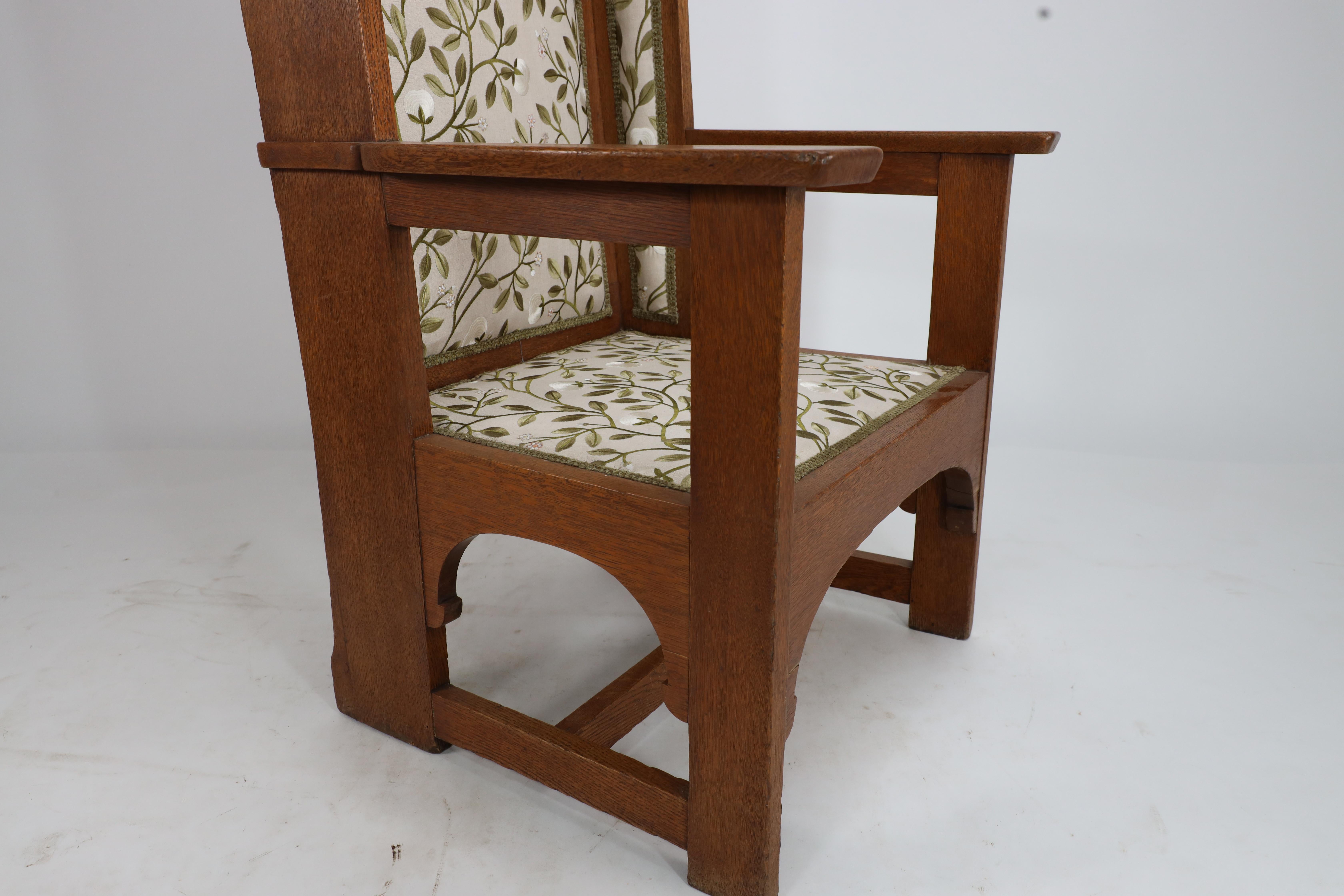 E G Punnet attributed. Probably made by William Birch. An oak wing back armchair For Sale 1