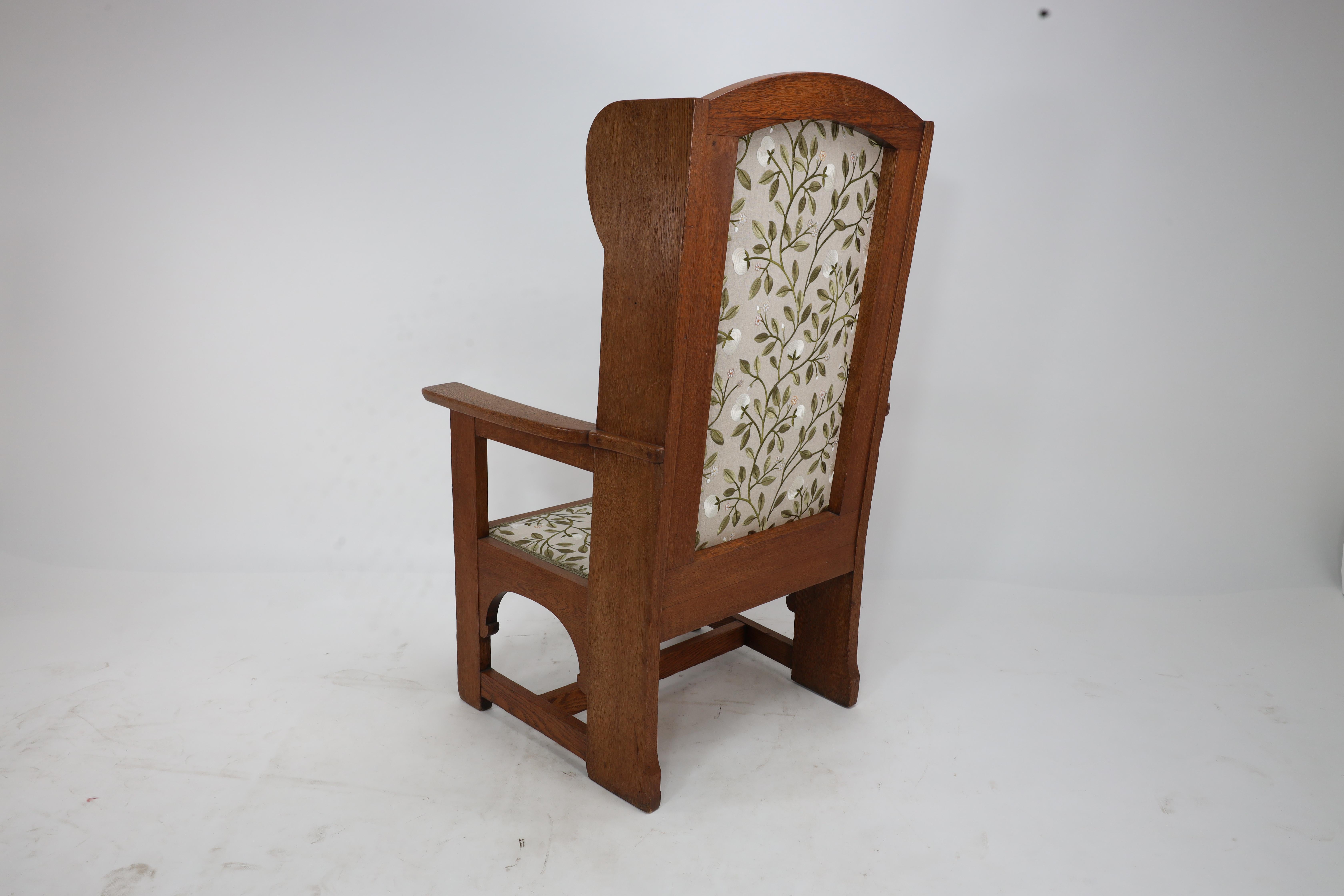 E G Punnet attributed. Probably made by William Birch. An oak wing back armchair For Sale 10
