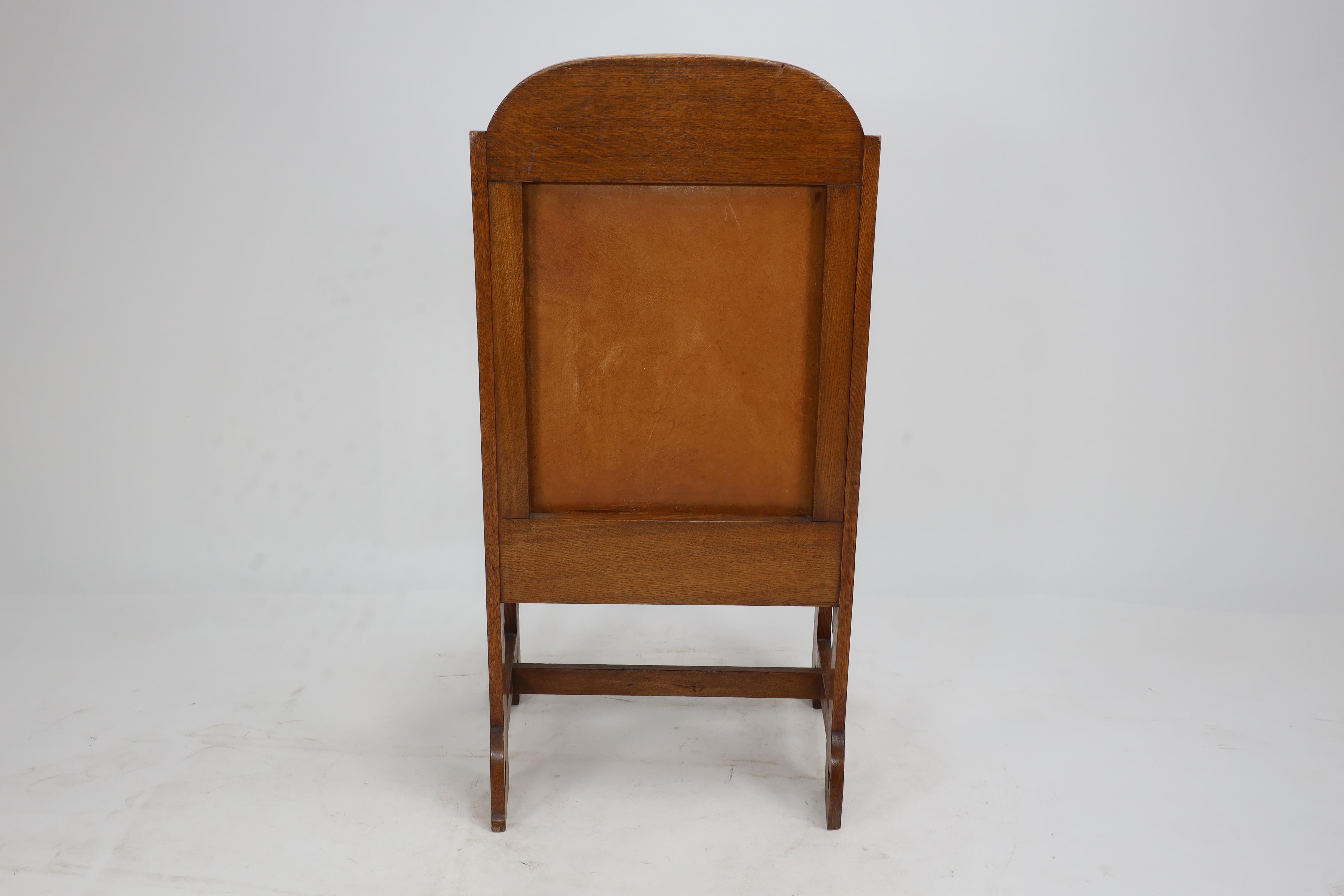 E G Punnet attributed. Probably made by William Birch. An oak wing back chair For Sale 11