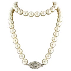 E. HABAN - Collar de perlas con cierre de oro de 18k y diamantes talla brillante 1,00ct
