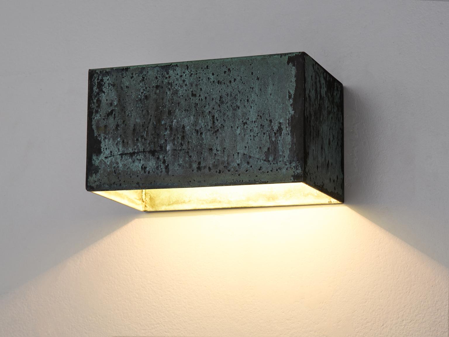 E. Hansson & Co., Sweden 1960s.

This large set of wall lights is designed by AB E. Hansson & Co. These geometric patinated lights feature traits of the style of Hans-Agne Jakobsen. The set is simplistic and qualitative and shows a deep warm green
