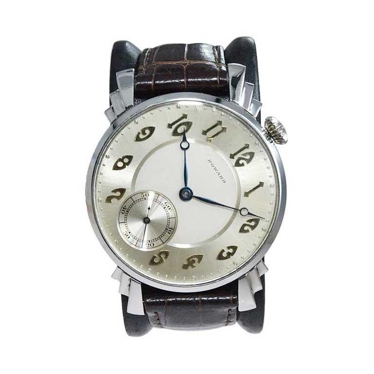 FACTORY / HOUSE: Howard Watch Co.
STYLE / REFERENCE: Art Deco / Wrist Watch / Custom Conversion to a wrist watch
METAL / MATERIAL: Steel with Exhibition Back
CIRCA / YEAR: 1921 Movement / European Case from 1980's
DIMENSIONS / SIZE: Length 56mm x