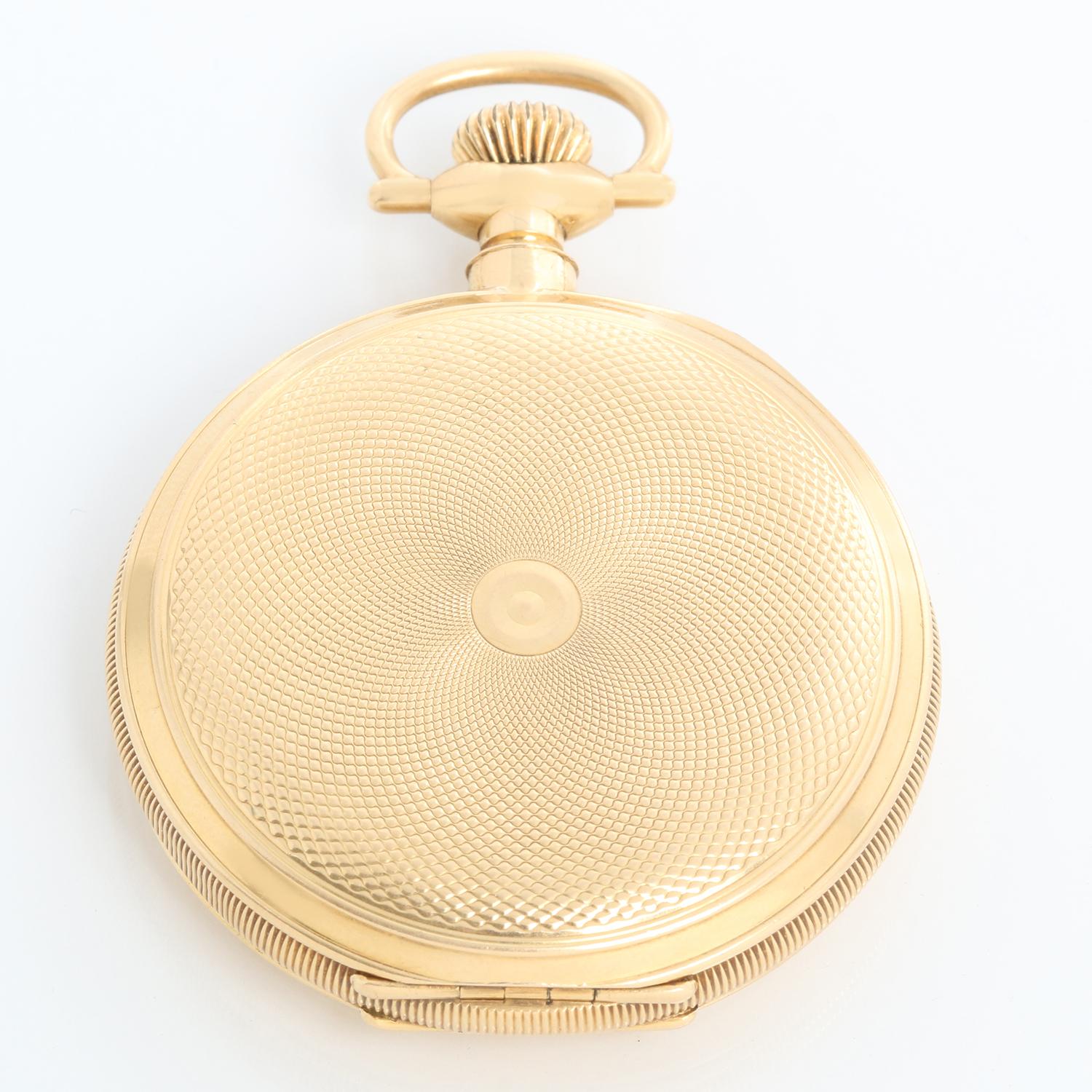 E. Howard Watch Co. 18K Yellow Gold Pocket Watch - Manual winding; 23 jewels . 18K Yellow Gold  ( 49 mm ) with an initial crest engraved in the back . White dial with Roman numerals and sub dial at 6 o'clock. Pre-owned with custom box. Very rare