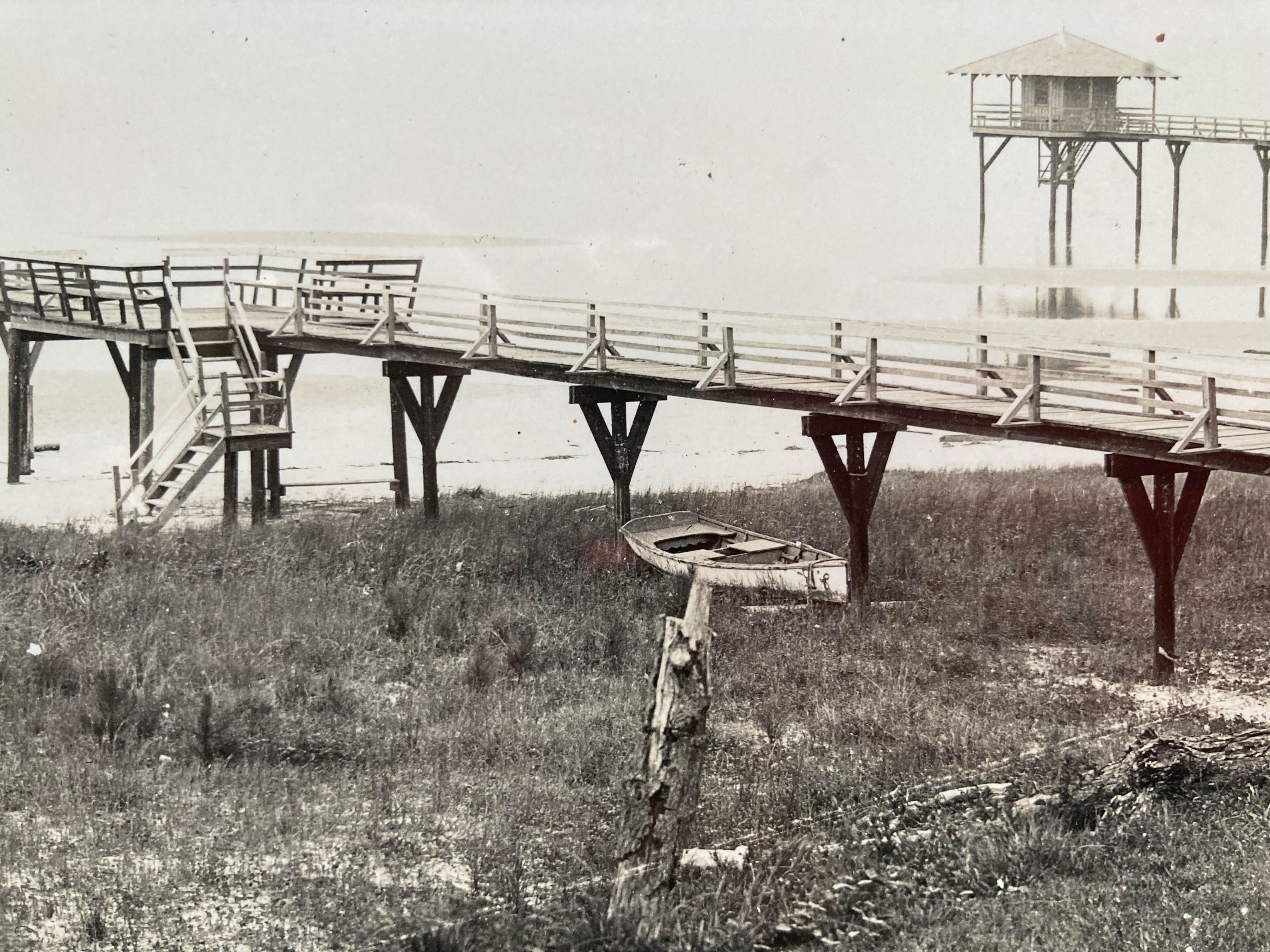 Camps on Lake Pontchartrain (very rare!) - Gray Black and White Photograph by E. J. Bellocq