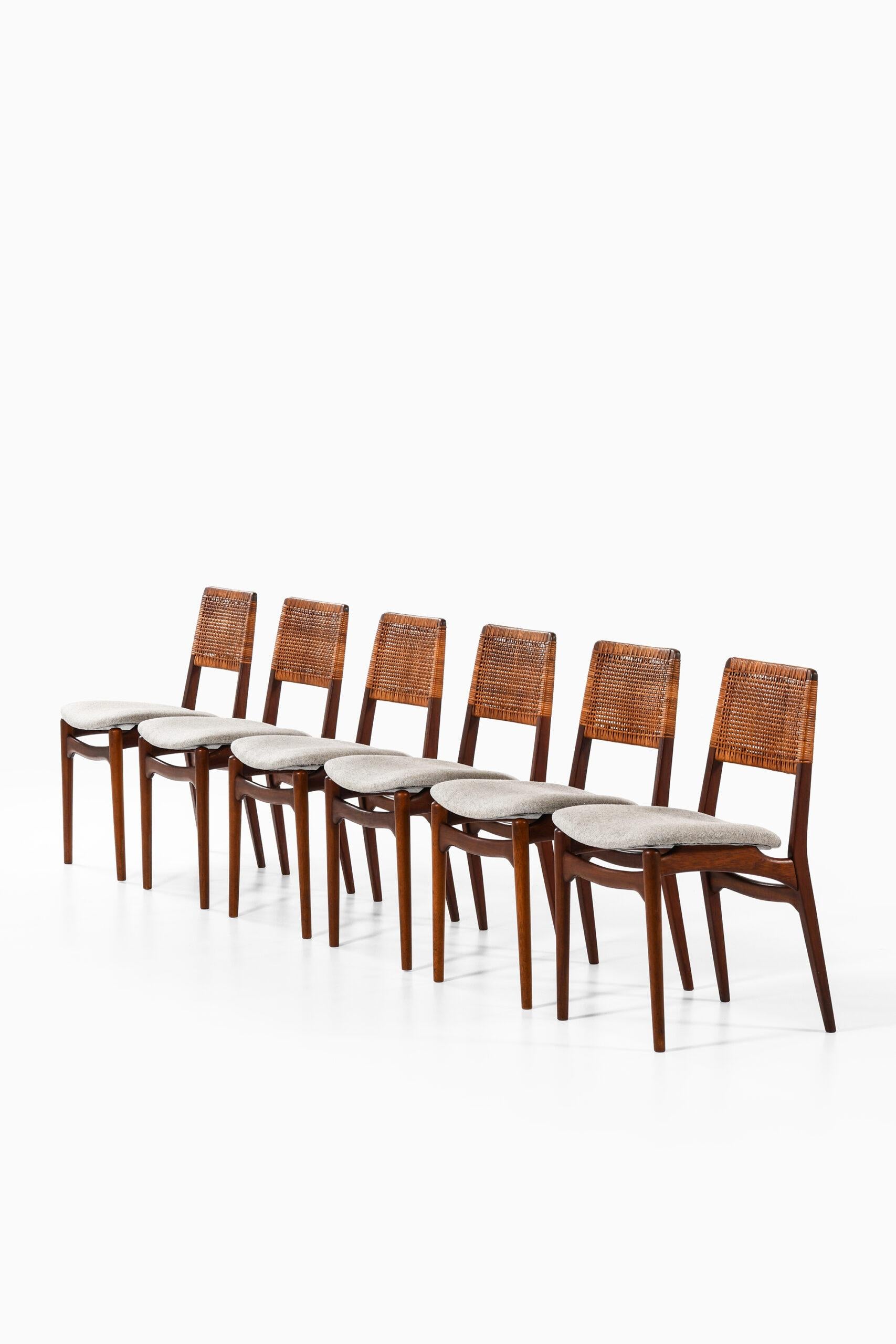 Rare set of 12 dining chairs model 47 designed by E. Knudsen. Produced by Jensen & Lykkegaard in Denmark.