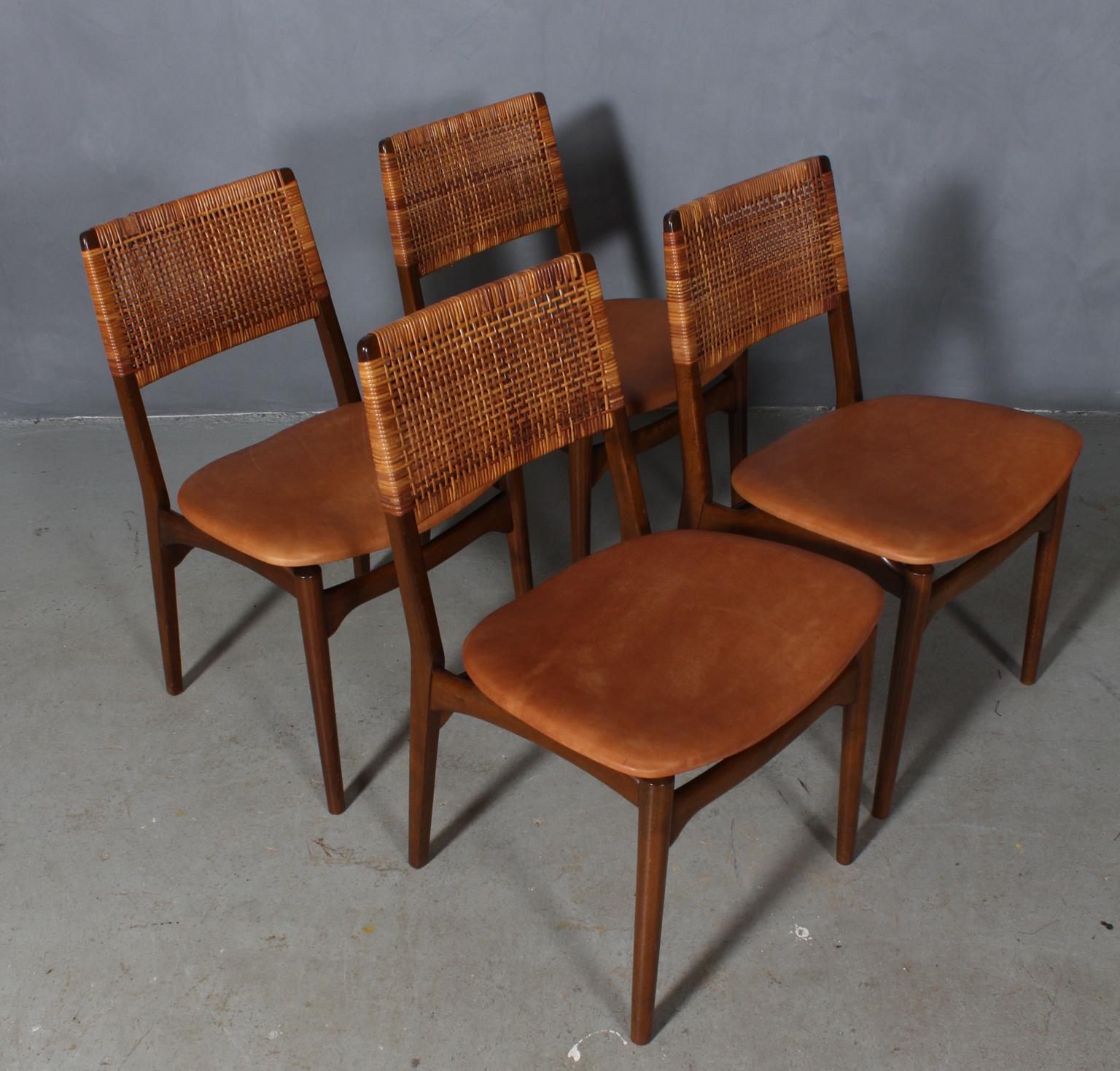 E. Knudsen set of four dining chairs with frame of beech, backs with cane.

New upholstered with vintage tan aniline leather.

  