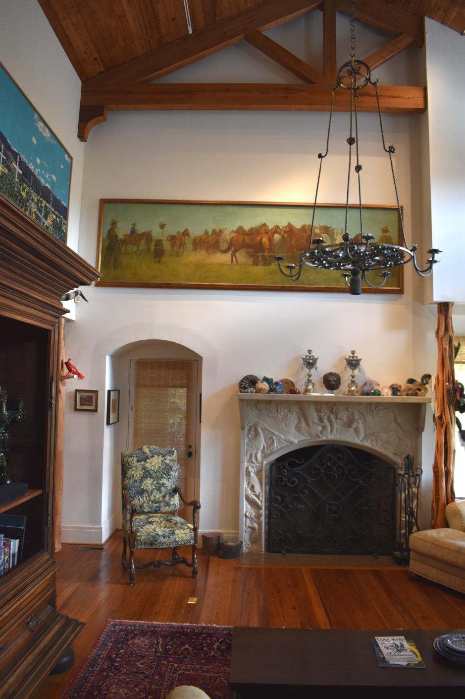 Major George Washington Littlefield died in 1920. He commissioned E. Martin Hennings around 1910 to do six large paintings of scenes from his 235,000-acre ( part of the XIT ) ranch to hang in his bank in Austin. 

I am not sure, but the bank