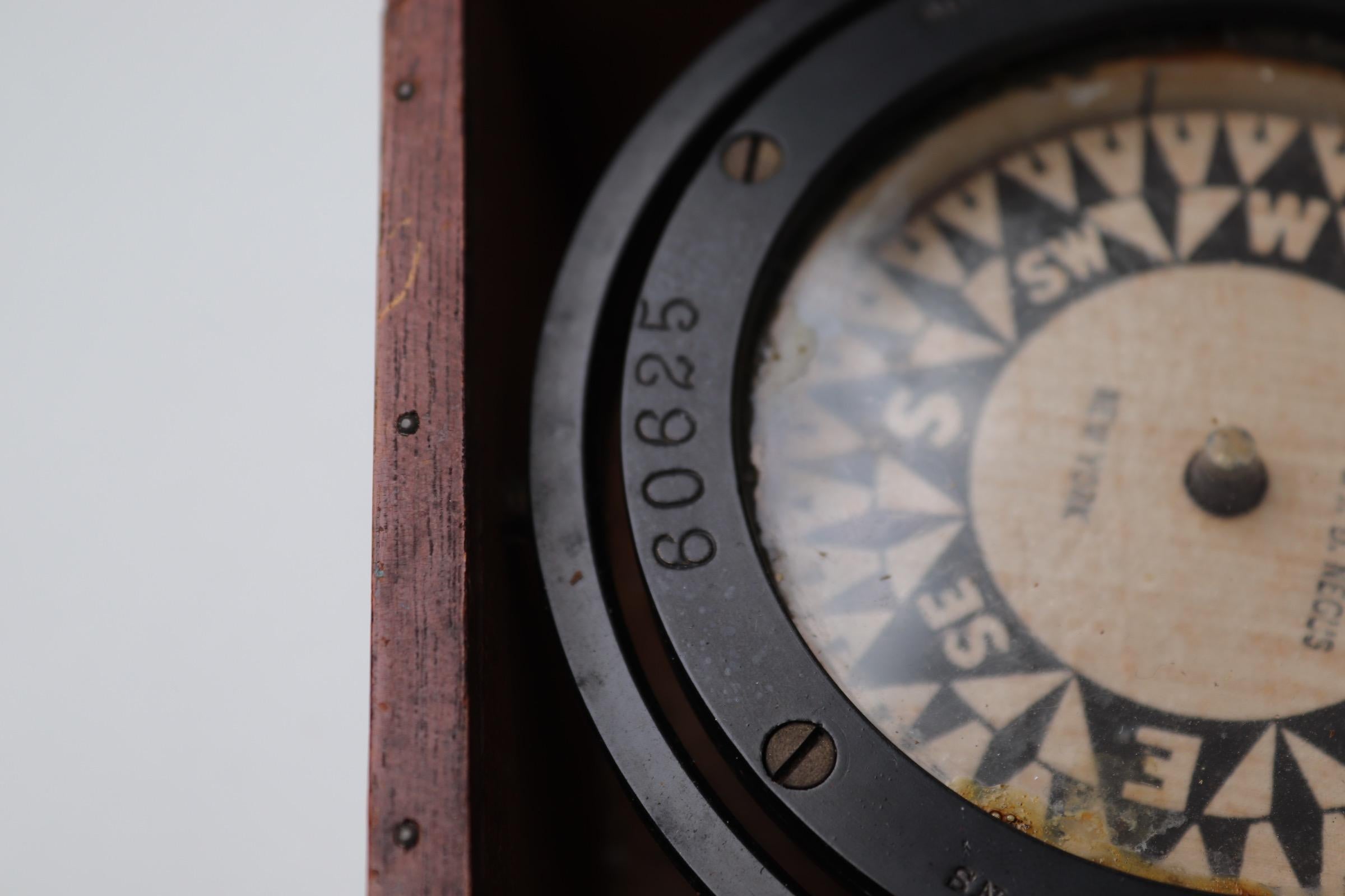 box containing a ship's compass