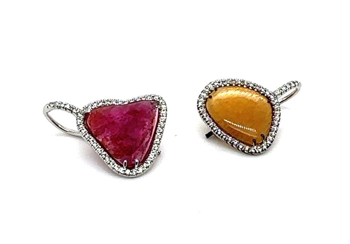 Orecchini pendenti in bianco 18 carati con pietra di Toumaline e oro

Metallo: Oro bianco 18 carati
A. Stone Info: 
      Toumaline 3.0 Ct
      Pietra d'oro da 1,87 carati
Info sui diamanti: 91 - H/SI Diamanti Brillanti Rotondi
Peso dei diamanti:
