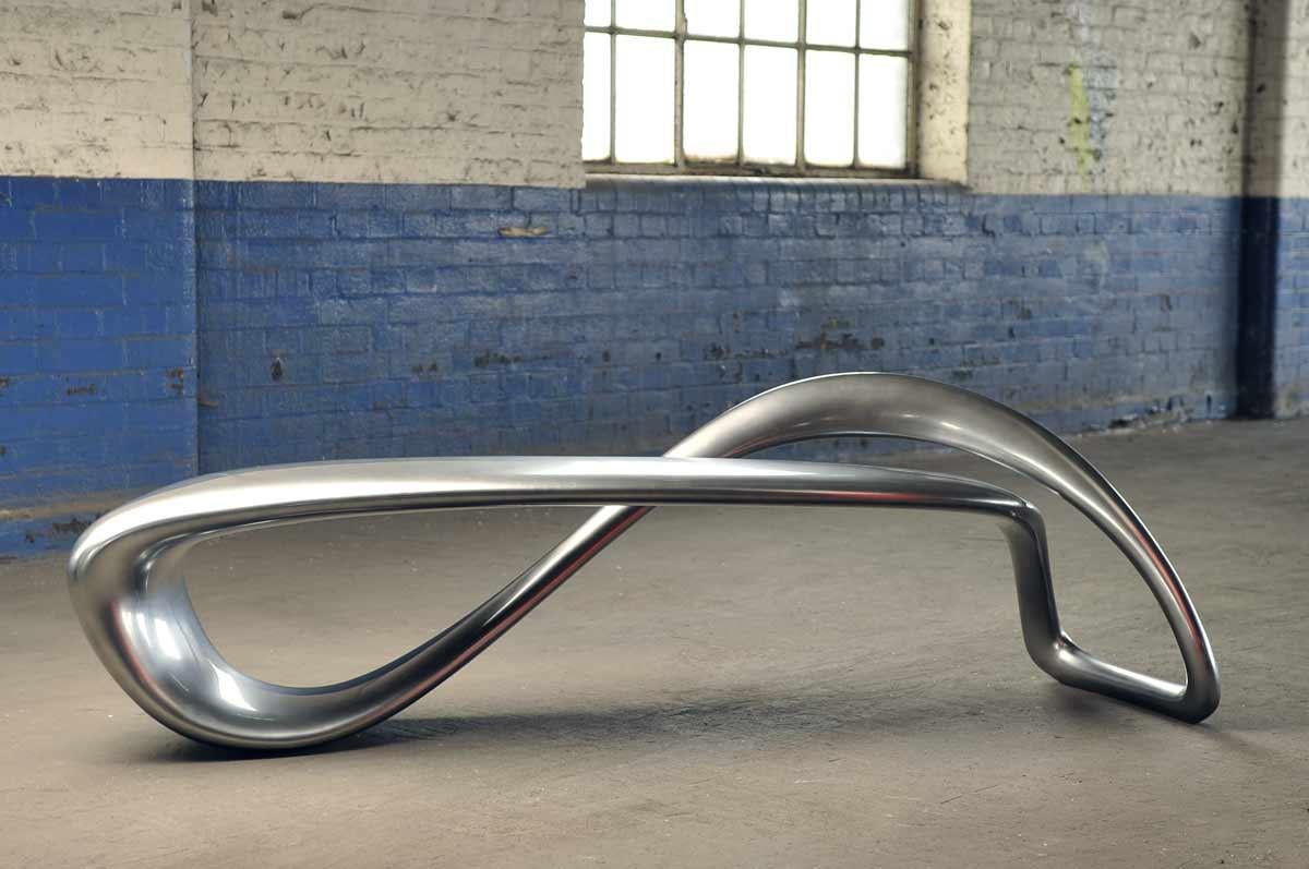 Minimalist E-Turn, Chrome Fibreglass Sculptural Bench Seat in Chrome by Brodie Neill For Sale