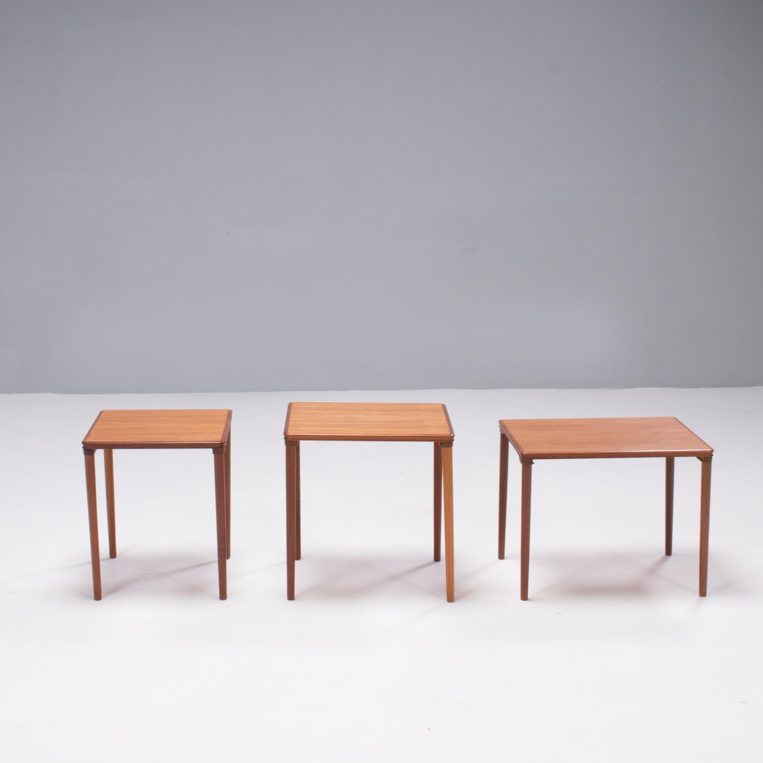 Designed by E. W. Bach and manufactured by Toften, this set of nesting tables is a fantastic example of 1960s Danish design.

Constructed from teak wood are a versatile and space saving piece that can be used in a multitude of ways.

The perfect