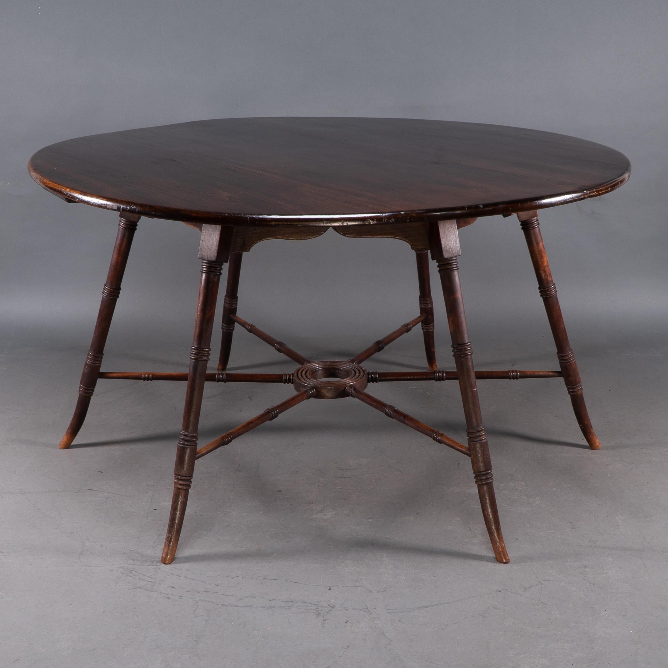 English E W Godwin, an Anglo-Japanese Aesthetic Movement walnut centre or dining table For Sale