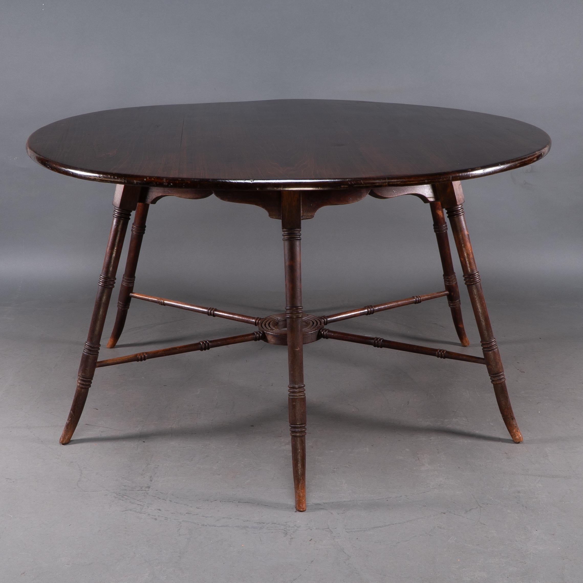 Turned E W Godwin, an Anglo-Japanese Aesthetic Movement walnut centre or dining table For Sale