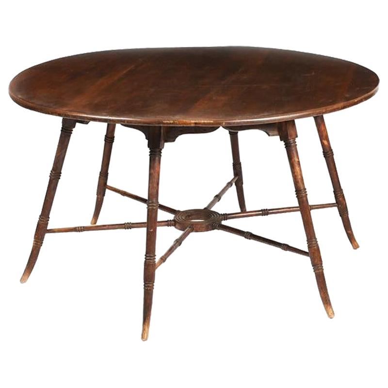 E W Godwin, an Anglo-Japanese Aesthetic Movement Walnut Centre or Dining Table For Sale