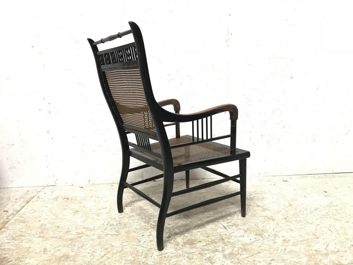 E W Godwin. An Anglo-Japanese Ebonized Beech and Caned Armchair In Good Condition In London, GB