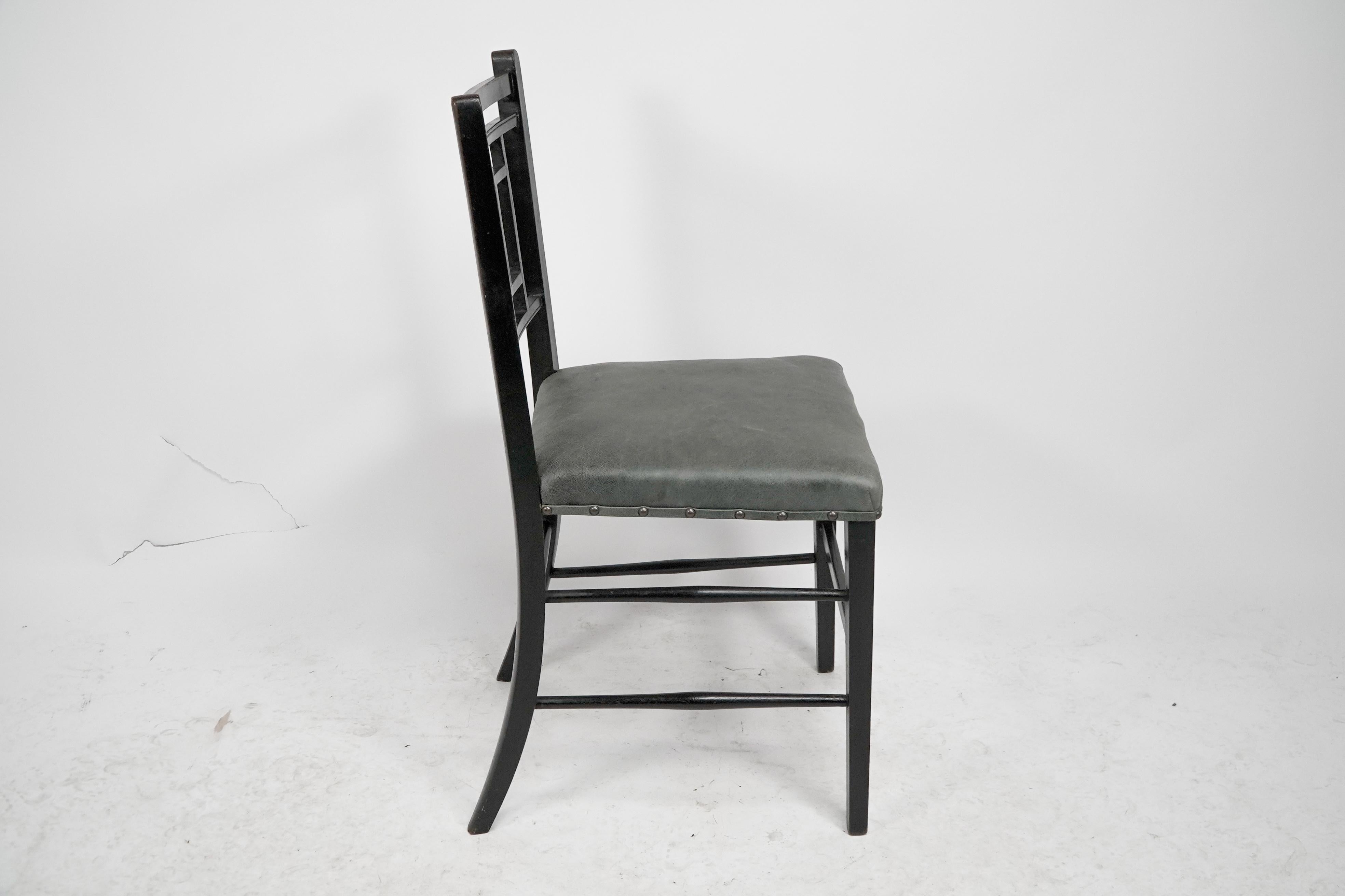 Ebonized E W Godwin An Anglo-Japanese ebonized side chair professionally upholstered For Sale