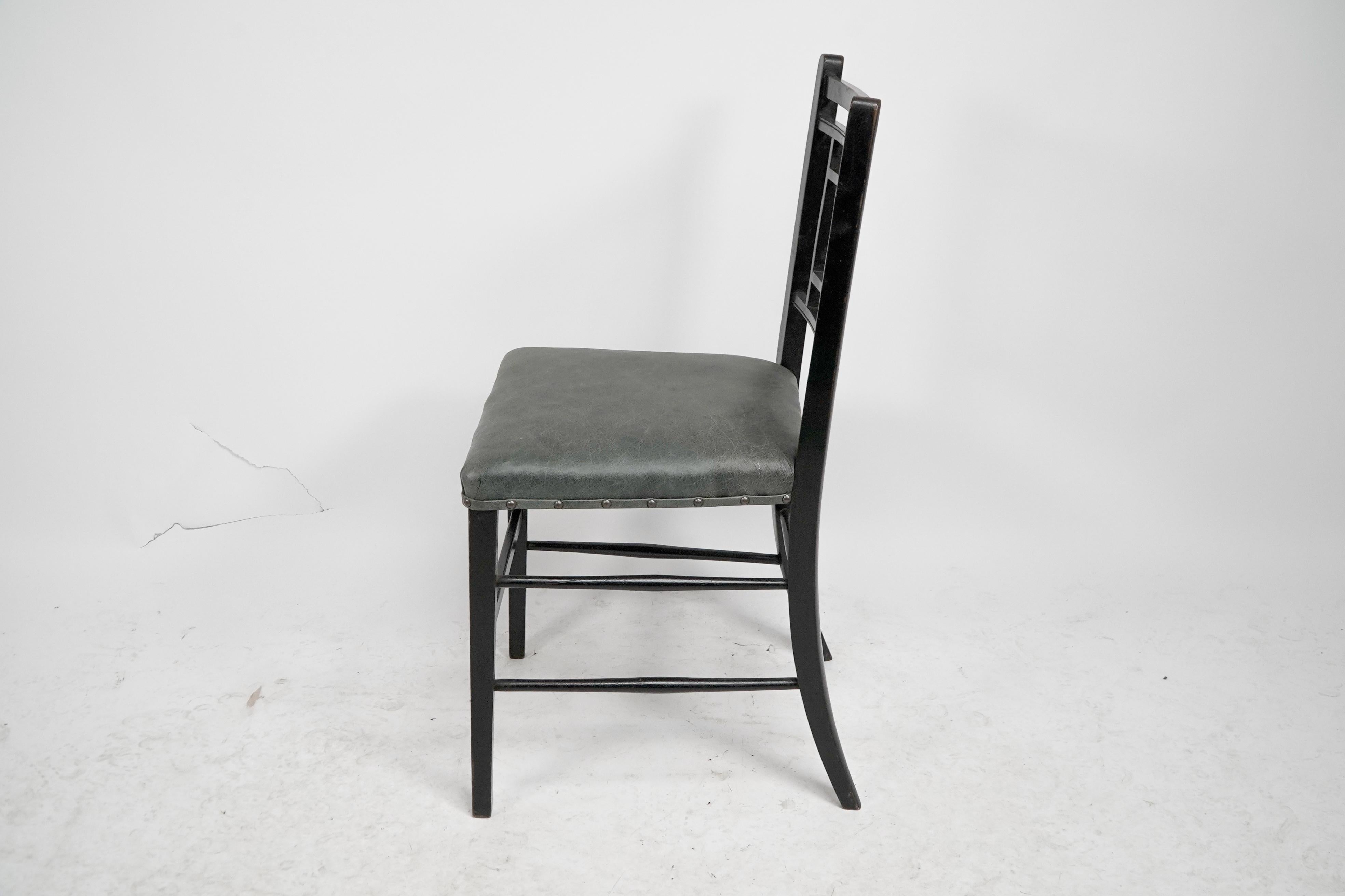 E W Godwin An Anglo-Japanese ebonized side chair professionally upholstered In Good Condition For Sale In London, GB