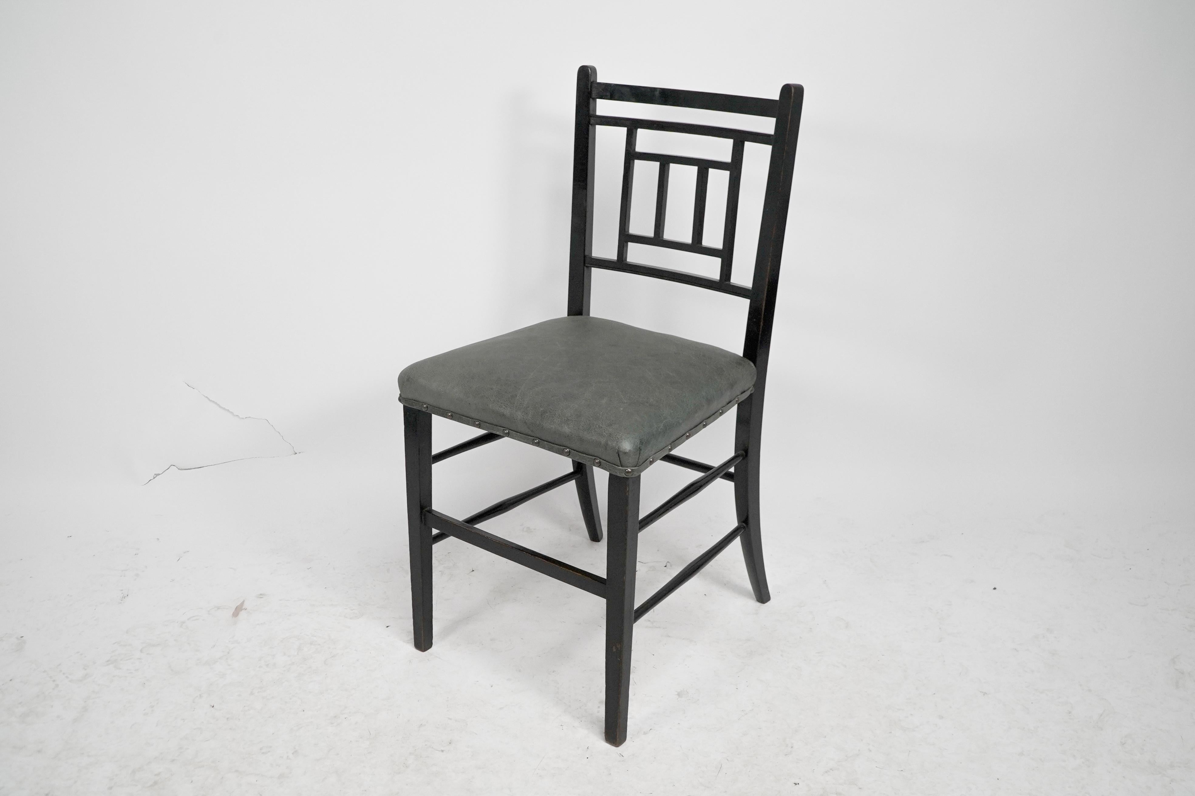 English E W Godwin An Anglo-Japanese ebonized side chair professionally upholstered For Sale
