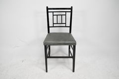 E W Godwin An Anglo-Japanese ebonized side chair professionally upholstered