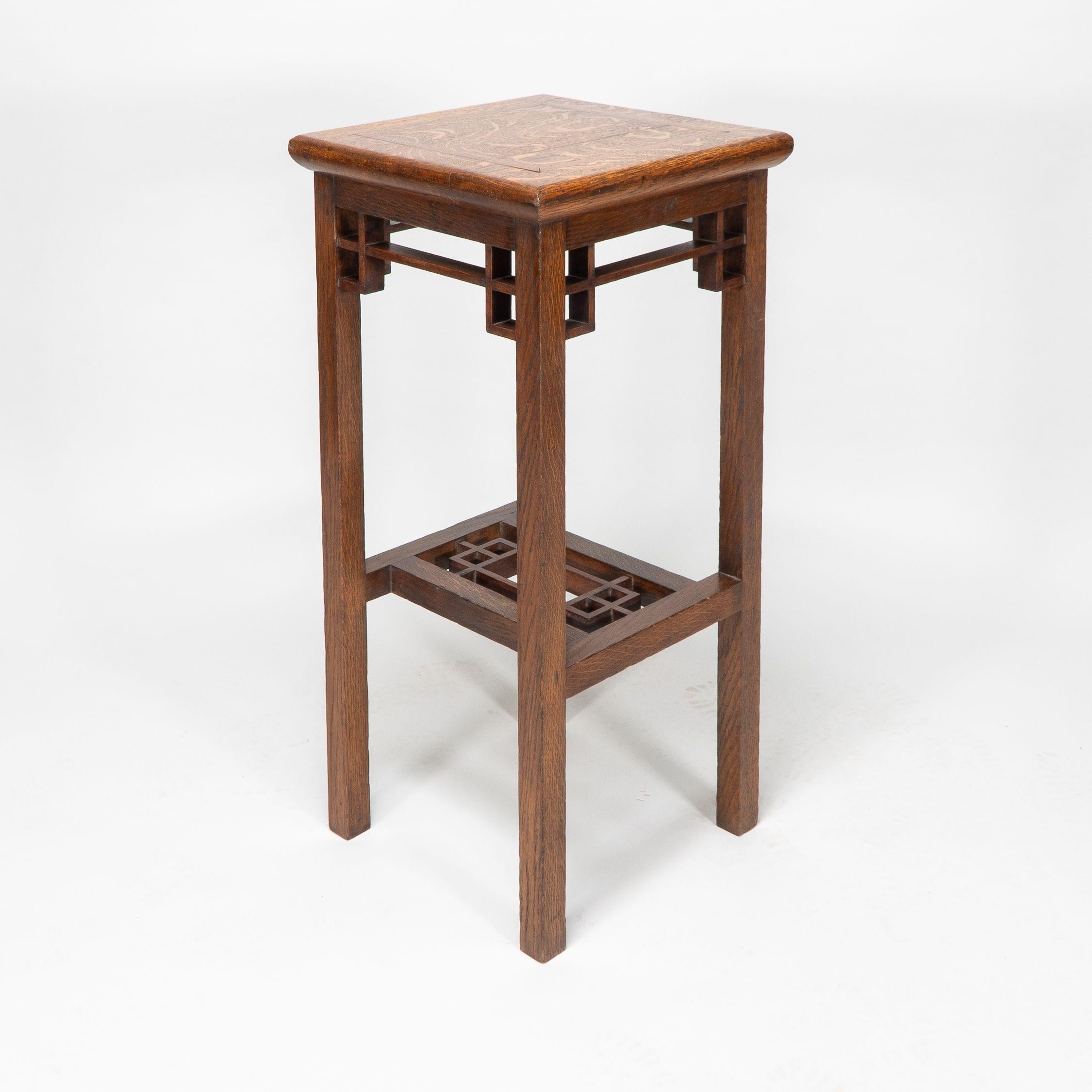 British E. W. Godwin. An Anglo-Japanese Oak & Lattice Statue Stand with wide inlaid top For Sale