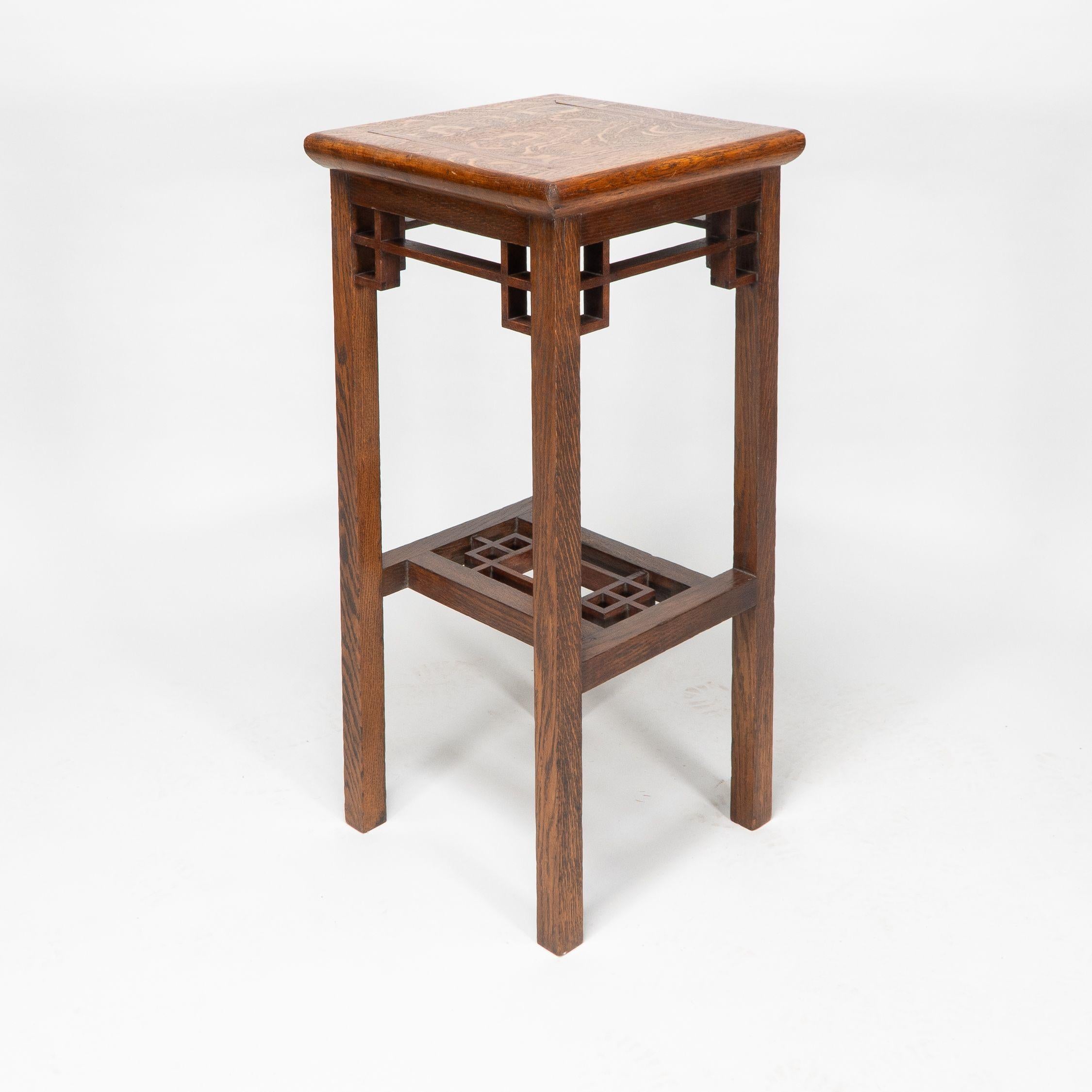E. W. Godwin. An Anglo-Japanese Oak & Lattice Statue Stand with wide inlaid top For Sale 1