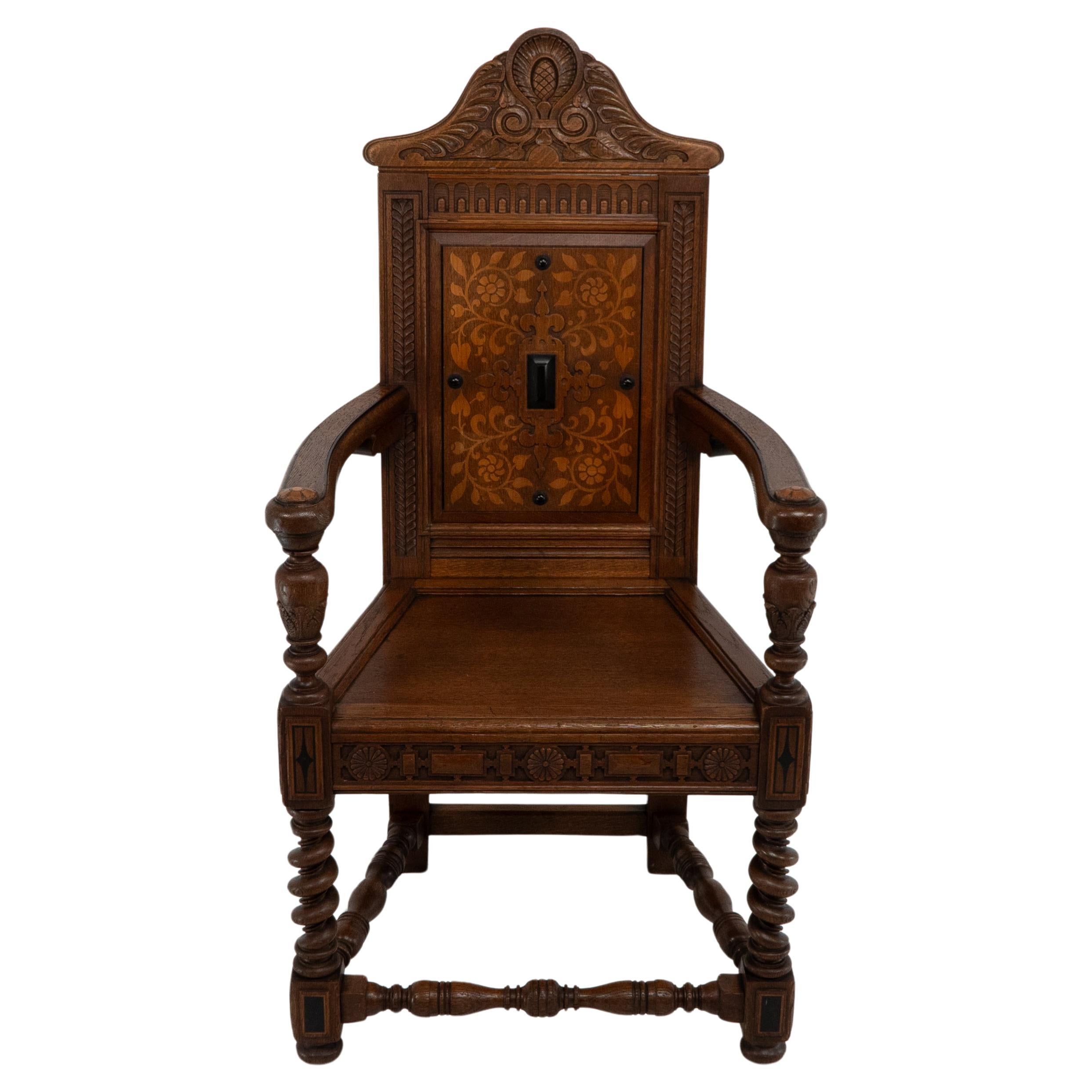 E W Godwin. An Aesthetic Movement Shakespeare armchair with marquetry decoration For Sale